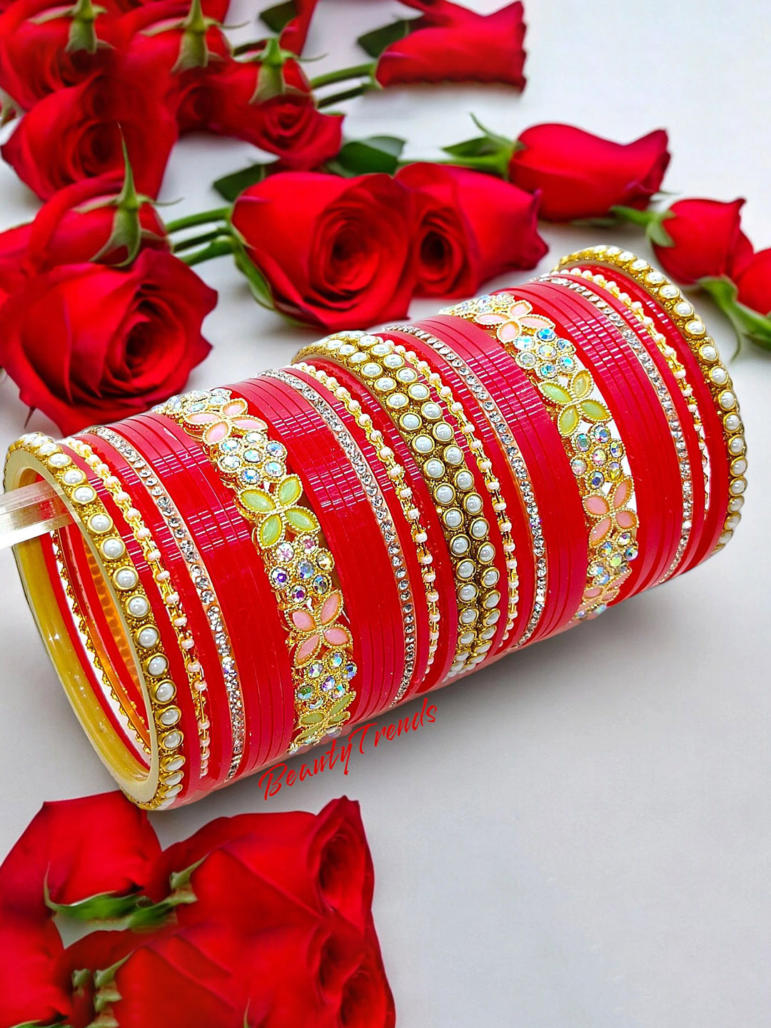 Sajjo Set Of 40 Brass-Plated Zircon Studded Bangles