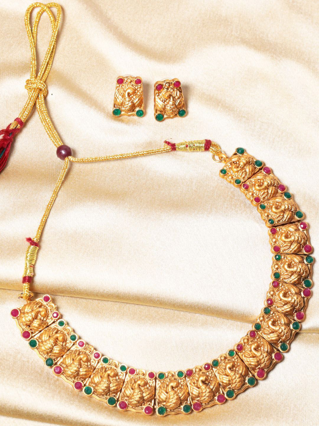 The  Pure Virgo Women Gold-Plated Stones Studded Peacock Shaped Jewellery Set