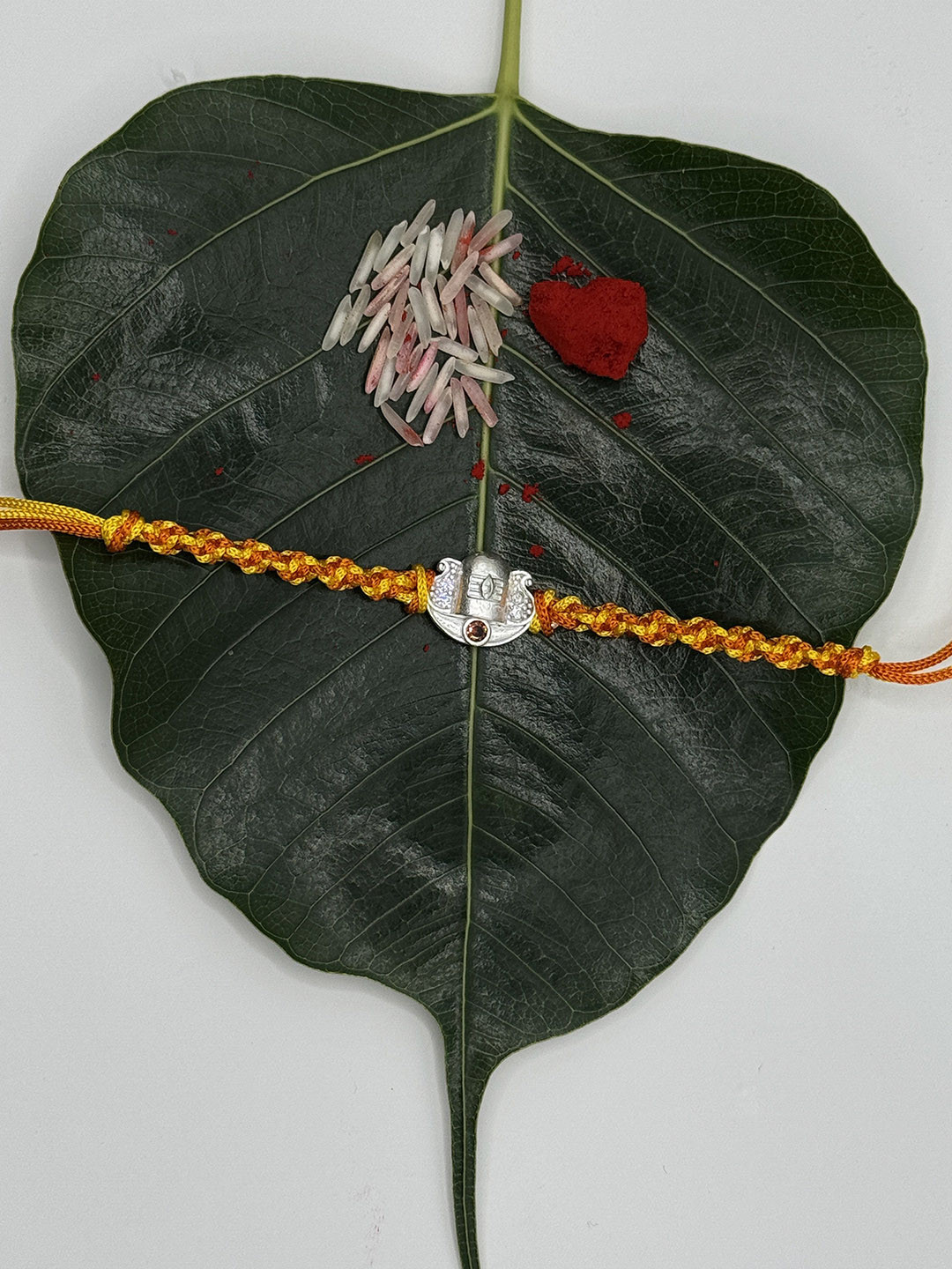 Dkeera 925 Sterling Silver-Plated Stone-Studded Lord Shiva Rakhi With Roli Chawal