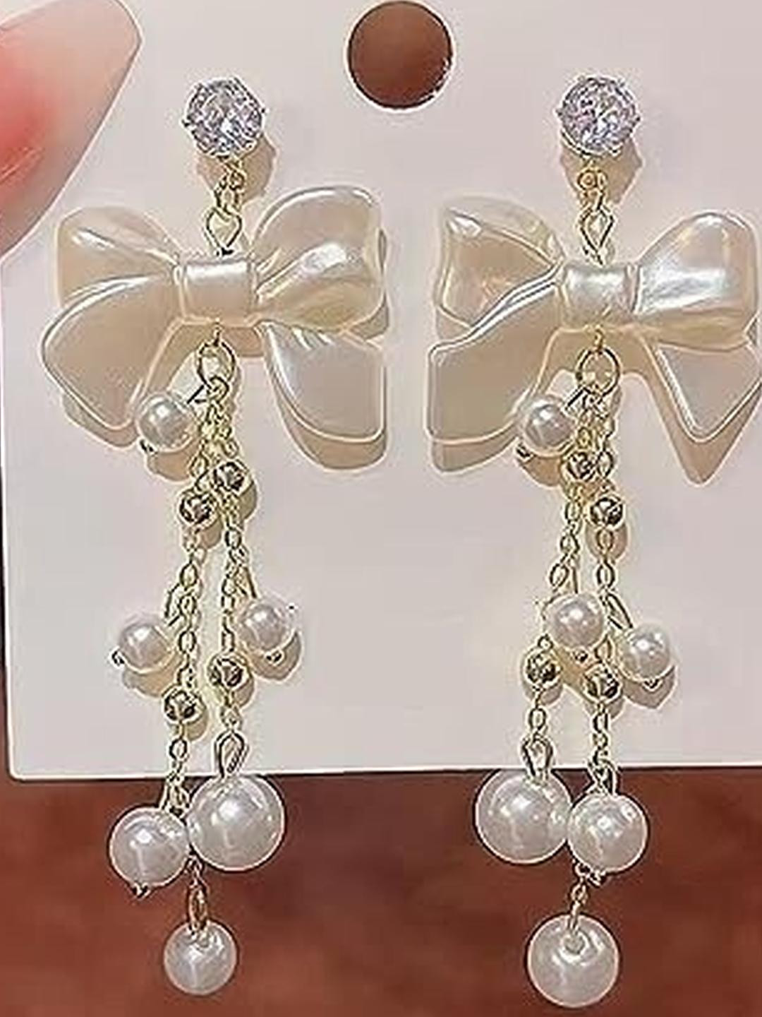 Khusha Creations Women Gold Plated Pearl Bow Dangler Earrings