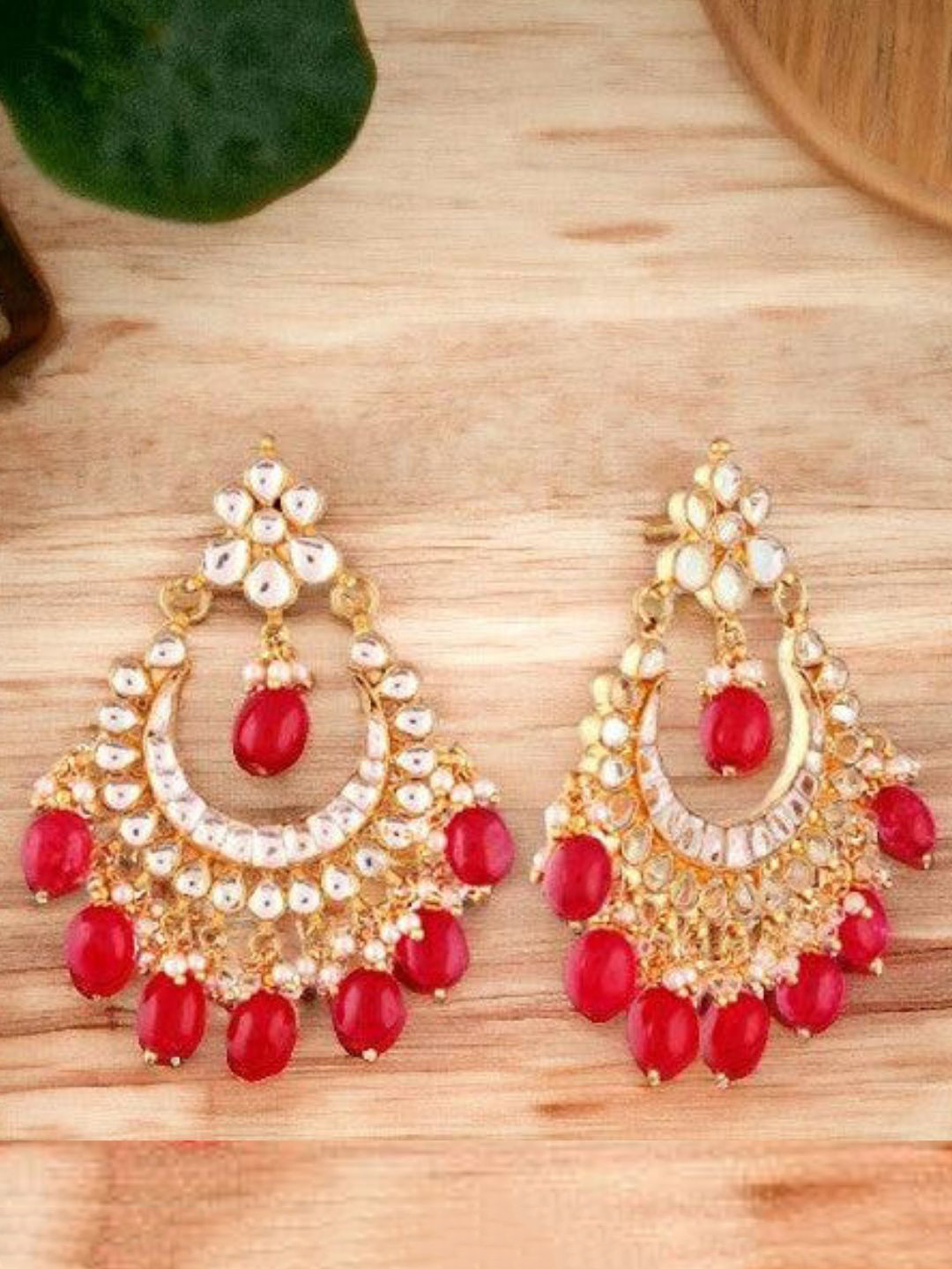 IKSAVA Gold-Plated Kundan Studded & Ruby Beaded Crescent Shaped Chandelier Chandbalis