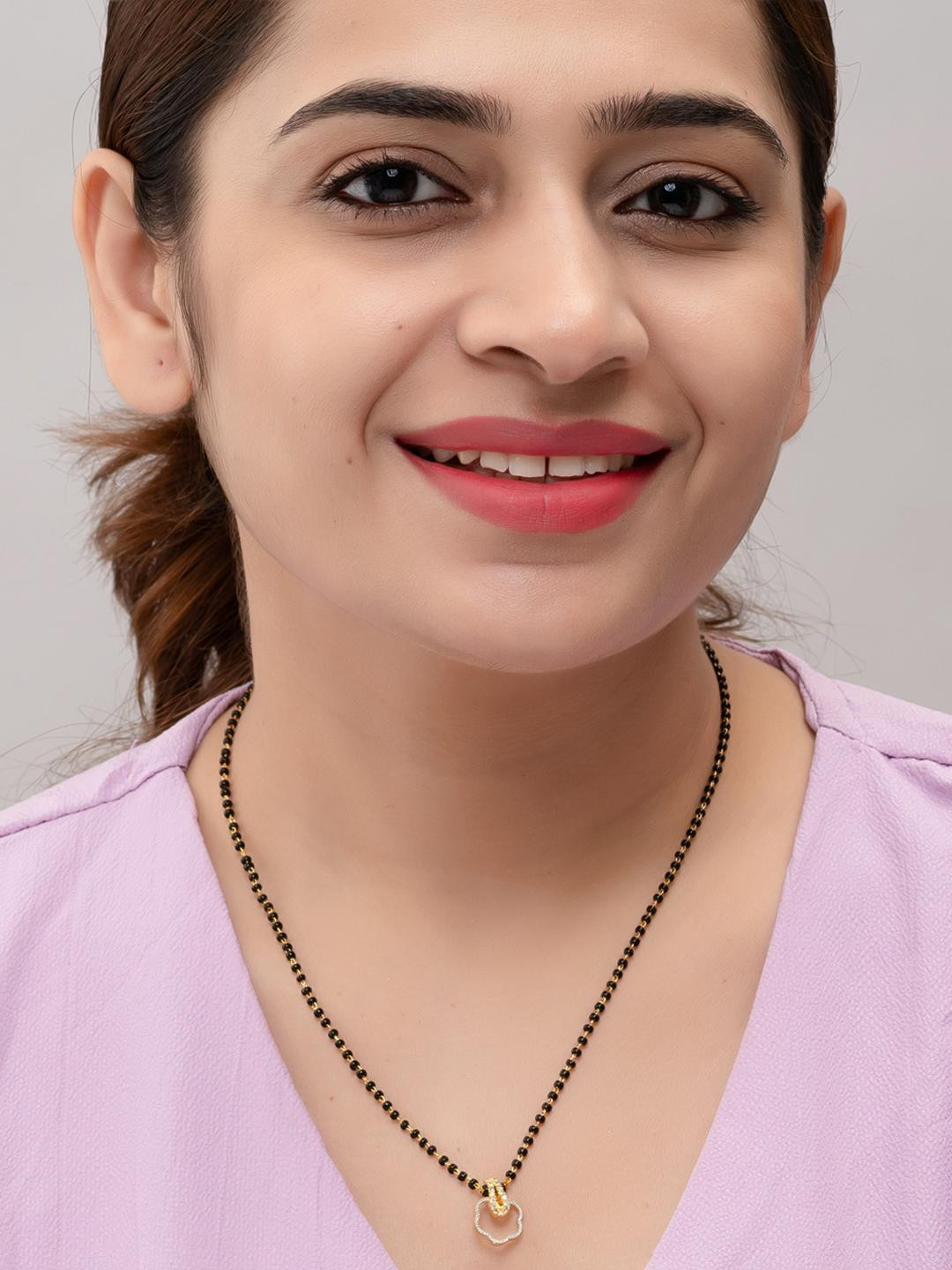 HEEVA CREATION Women Black & Gold-Plated Metal Artificial Stones & Beads Mangalsutra