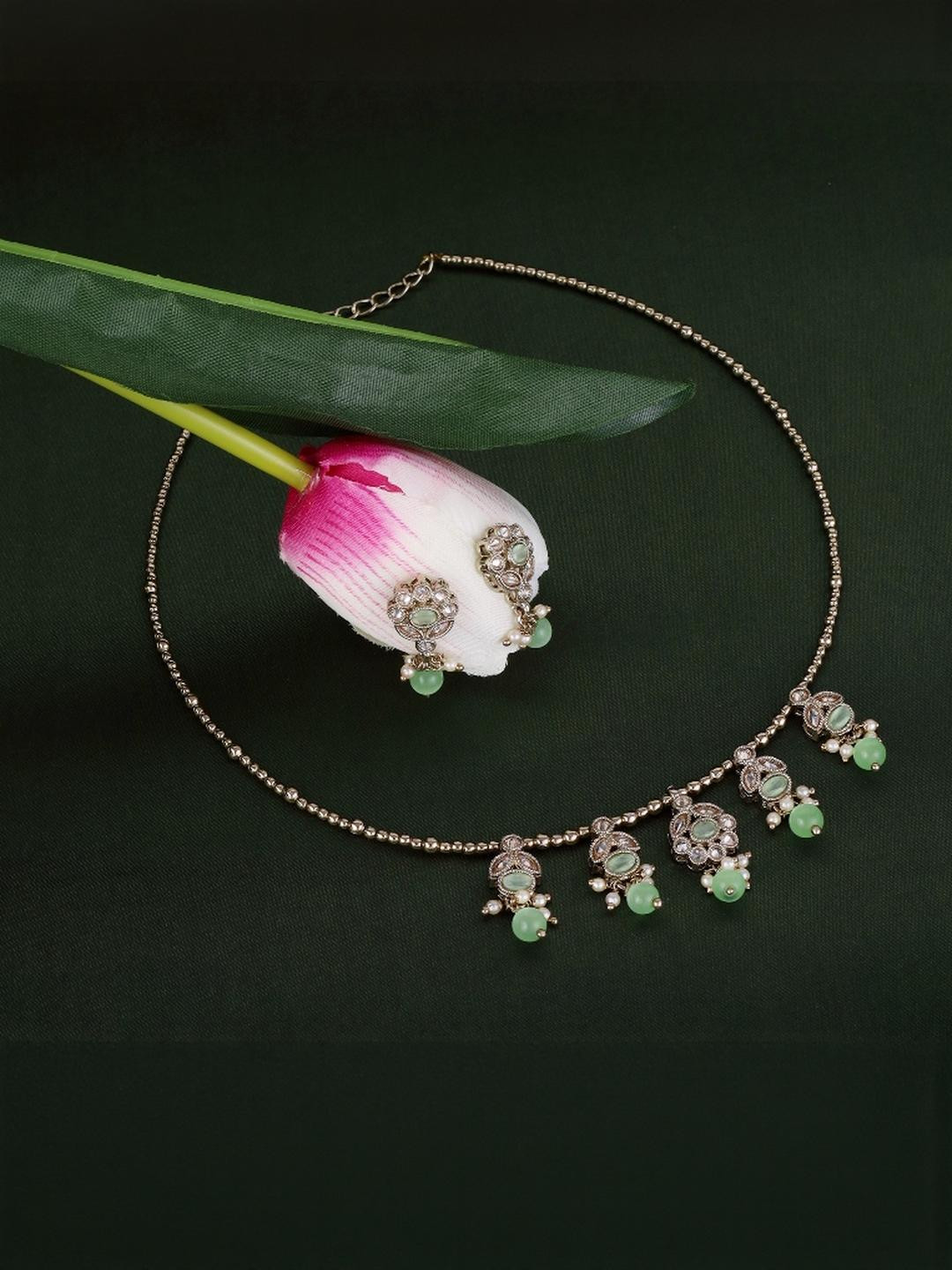 SALONI FASHION JEWELLERY Women Green Leaf and Oval Shape Crystal Gold-Plated Jewellery Set