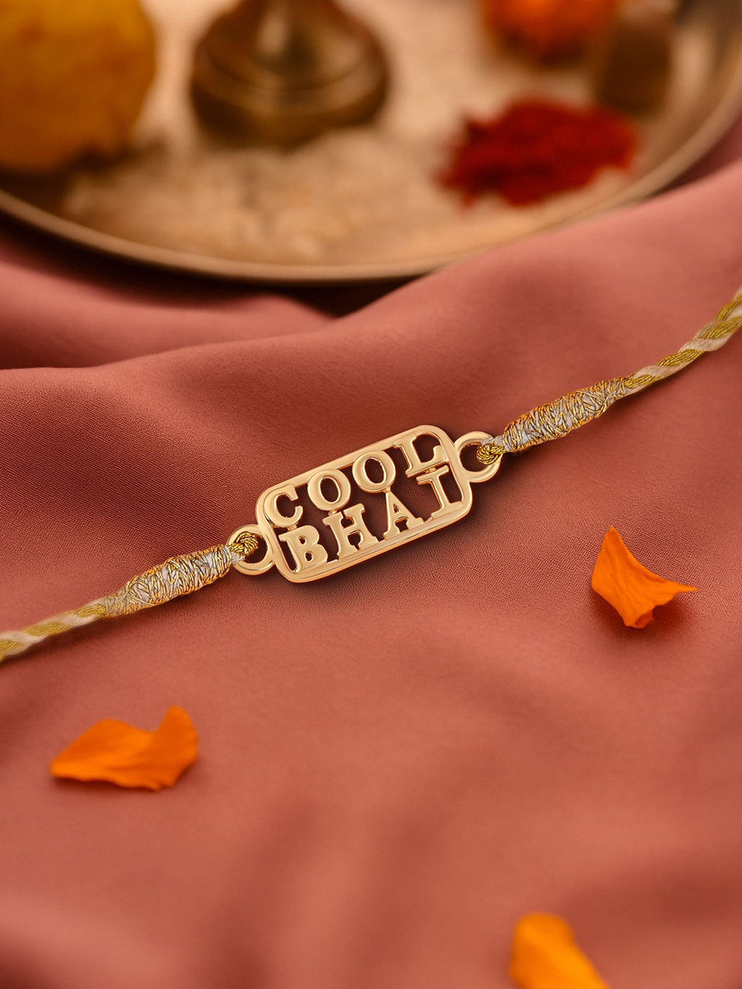 Ornate Jewels 18K Gold Plated Cool Bhai Rakhi With Roli Chawal