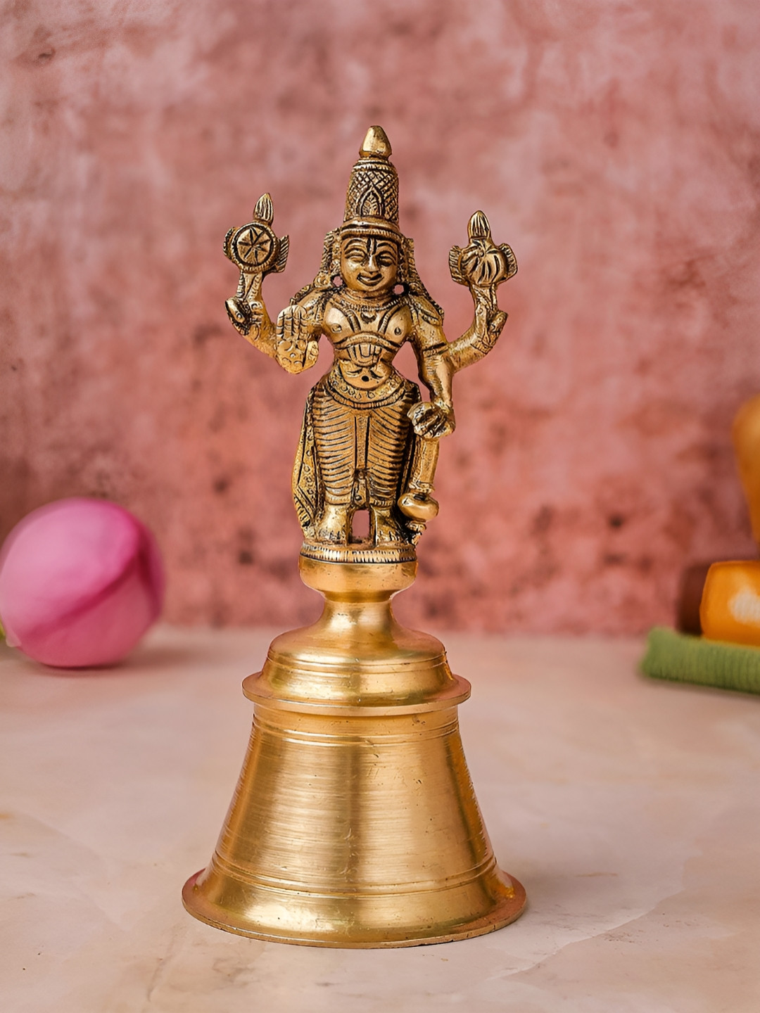 The Advitya Gold-Toned Religious Lord Vishnu Standing On Ringing Bell Curio Showpiece