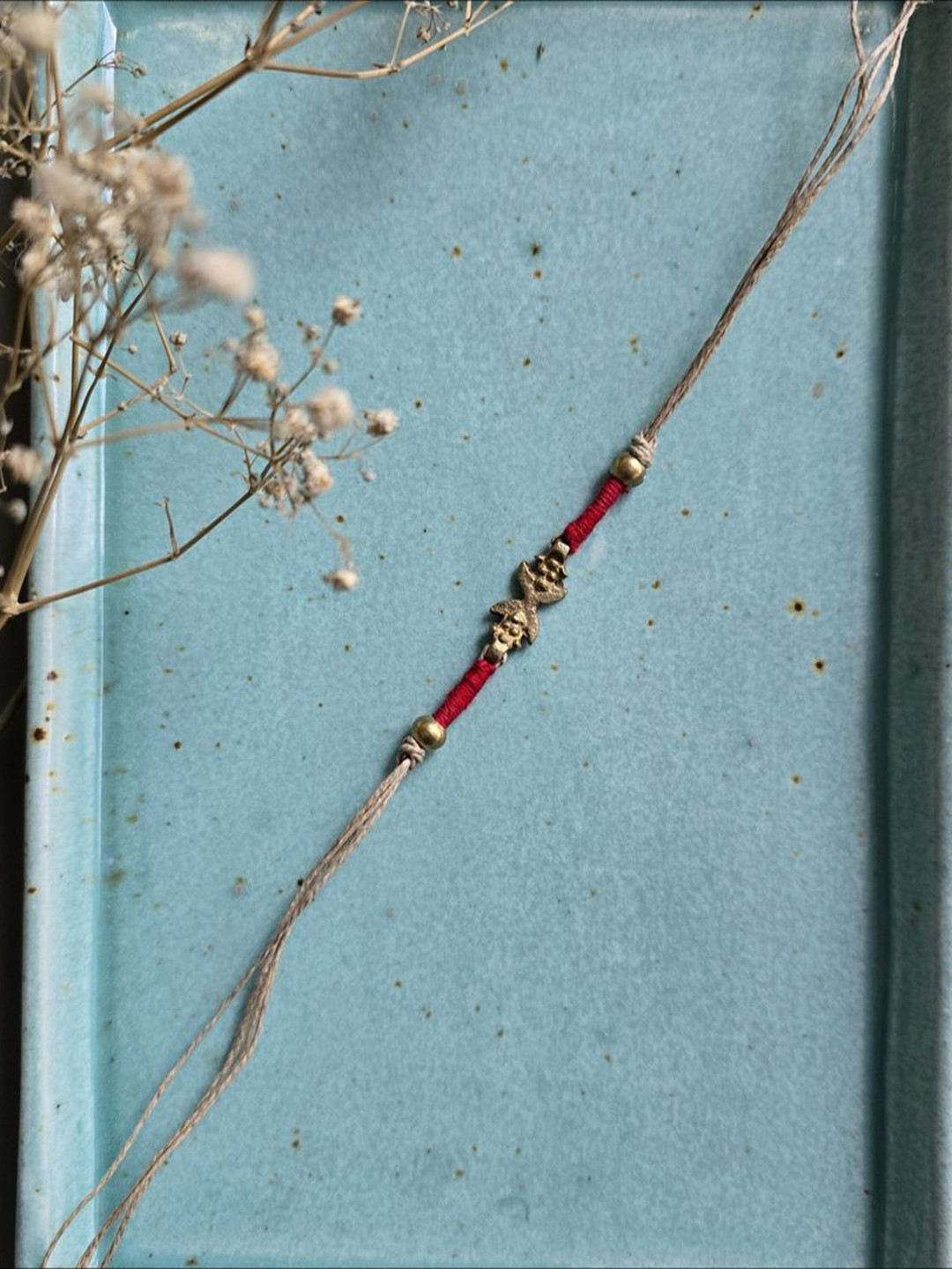 Studio Anviksha Charm Jute Thread Rakhi