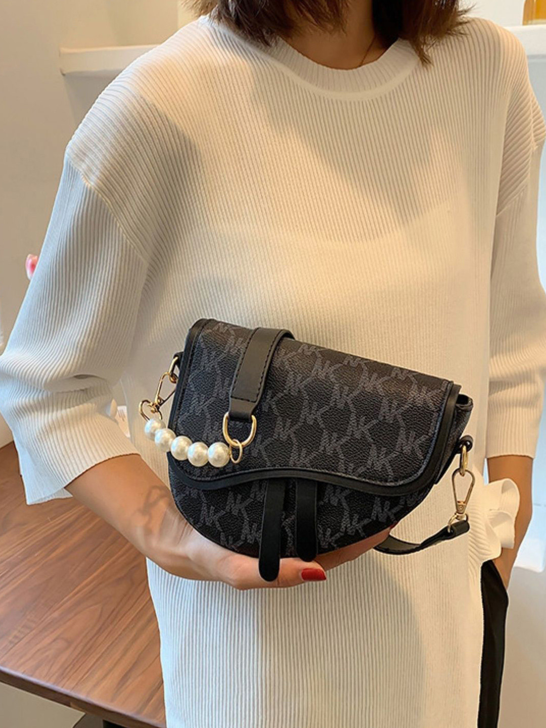 StyleCast Tupography Printed Structured Sling Bag