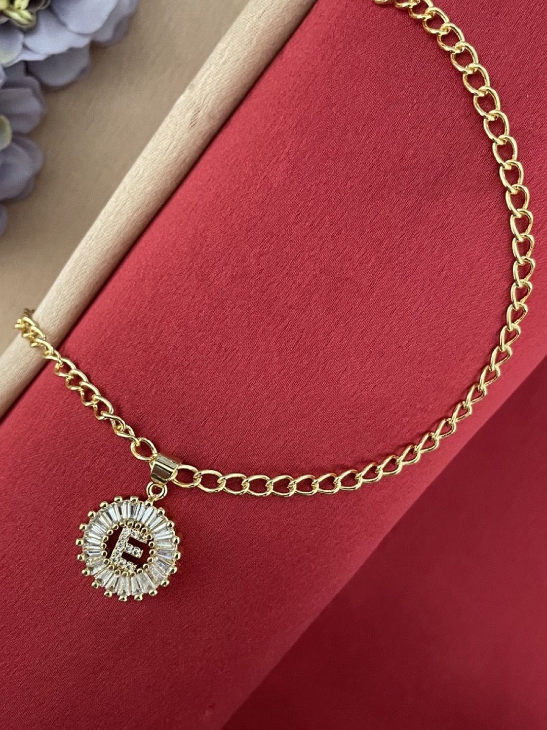 Digital Dress Room E Letter AD Studded Round Wraparound Rakhi