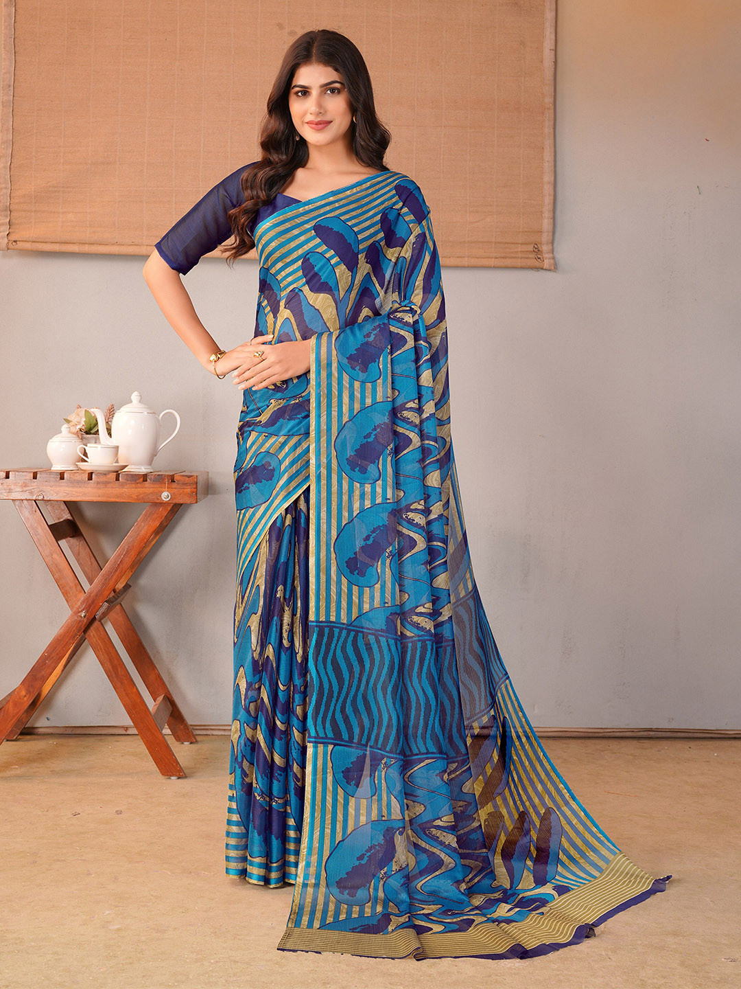 Garden Vareli Abstract Print Saree with Striped Border