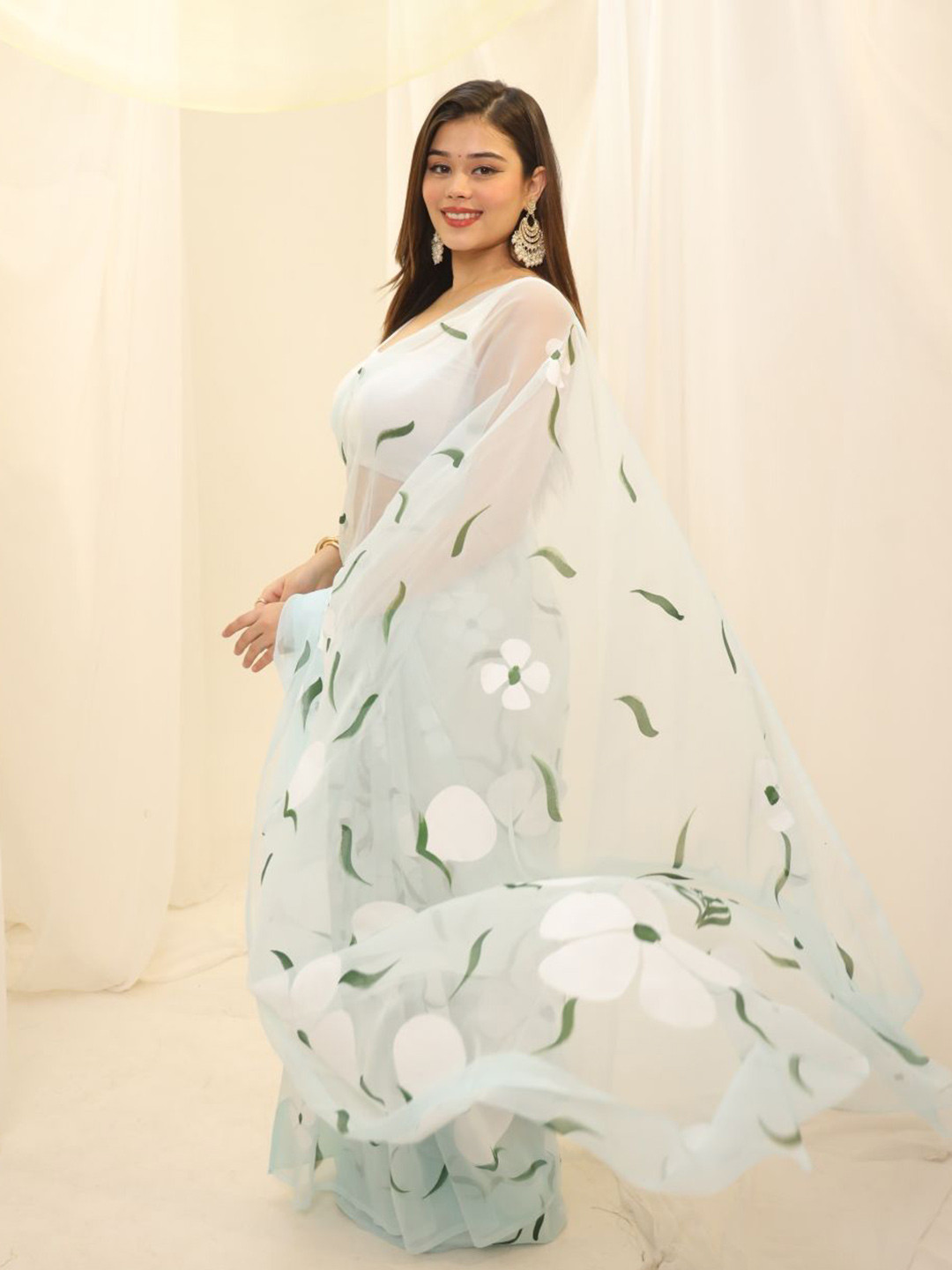 Swadeshi Shringaar Pastel Blue Floral Hand Painted Georgette Saree