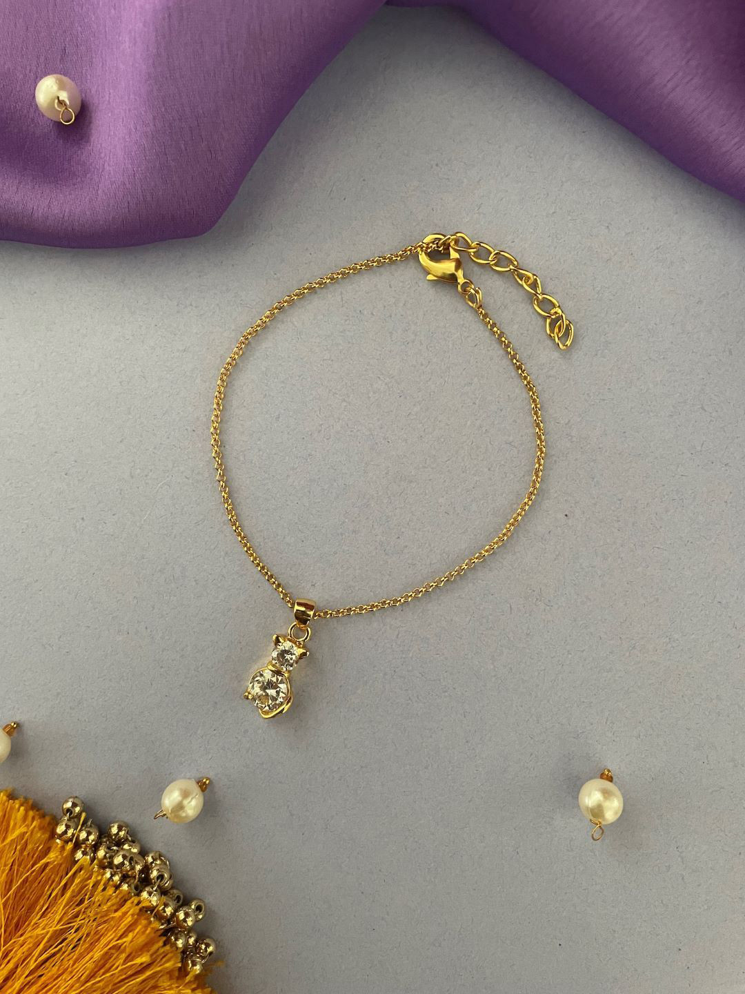 Digital Dress Room Set Of 2 Gold-Plated AD Studded Cat Pendant Lumba Rakhi