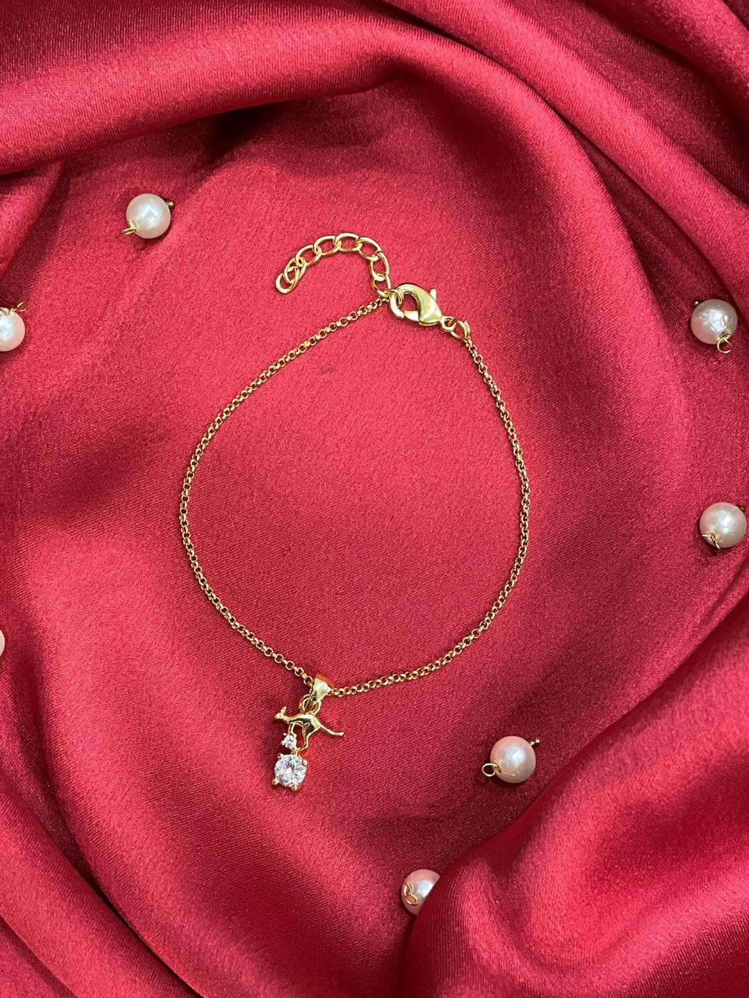 Digital Dress Room Set Of 2 Gold-Plated AD Studded Kangaroo Pendant Lumba Rakhis