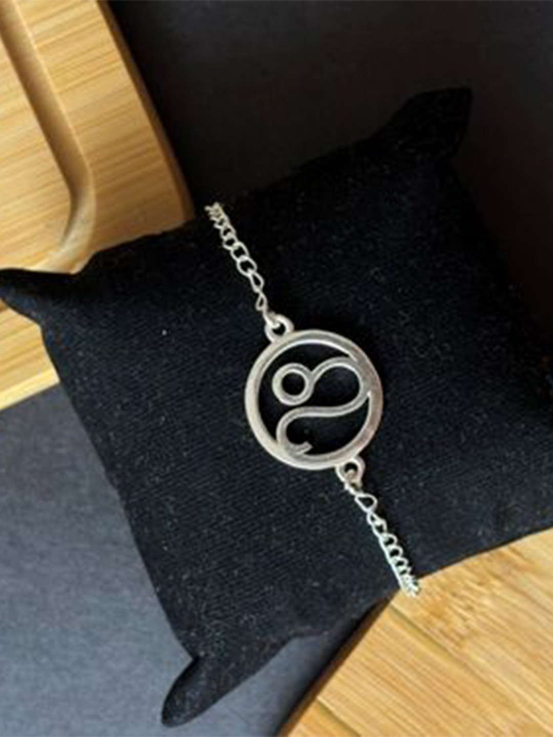 SANAA CREATIONS Silver-Plated Pisces Charm Wraparound Rakhi