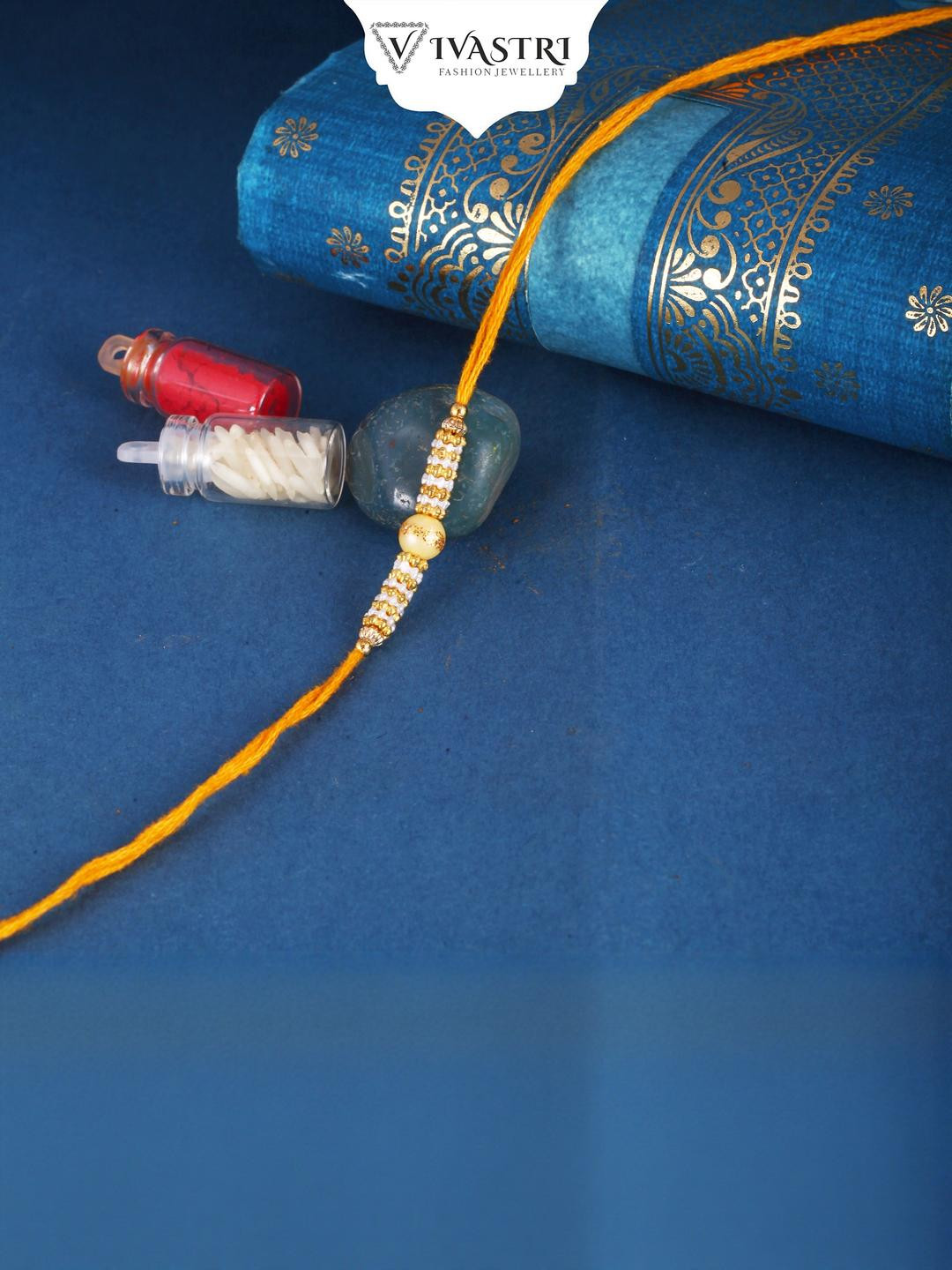 Vivastri Pearls Stone  Gold and Rhodium Plated Alloy Rakhi for Lovely Brother [VIVA1214RKG]