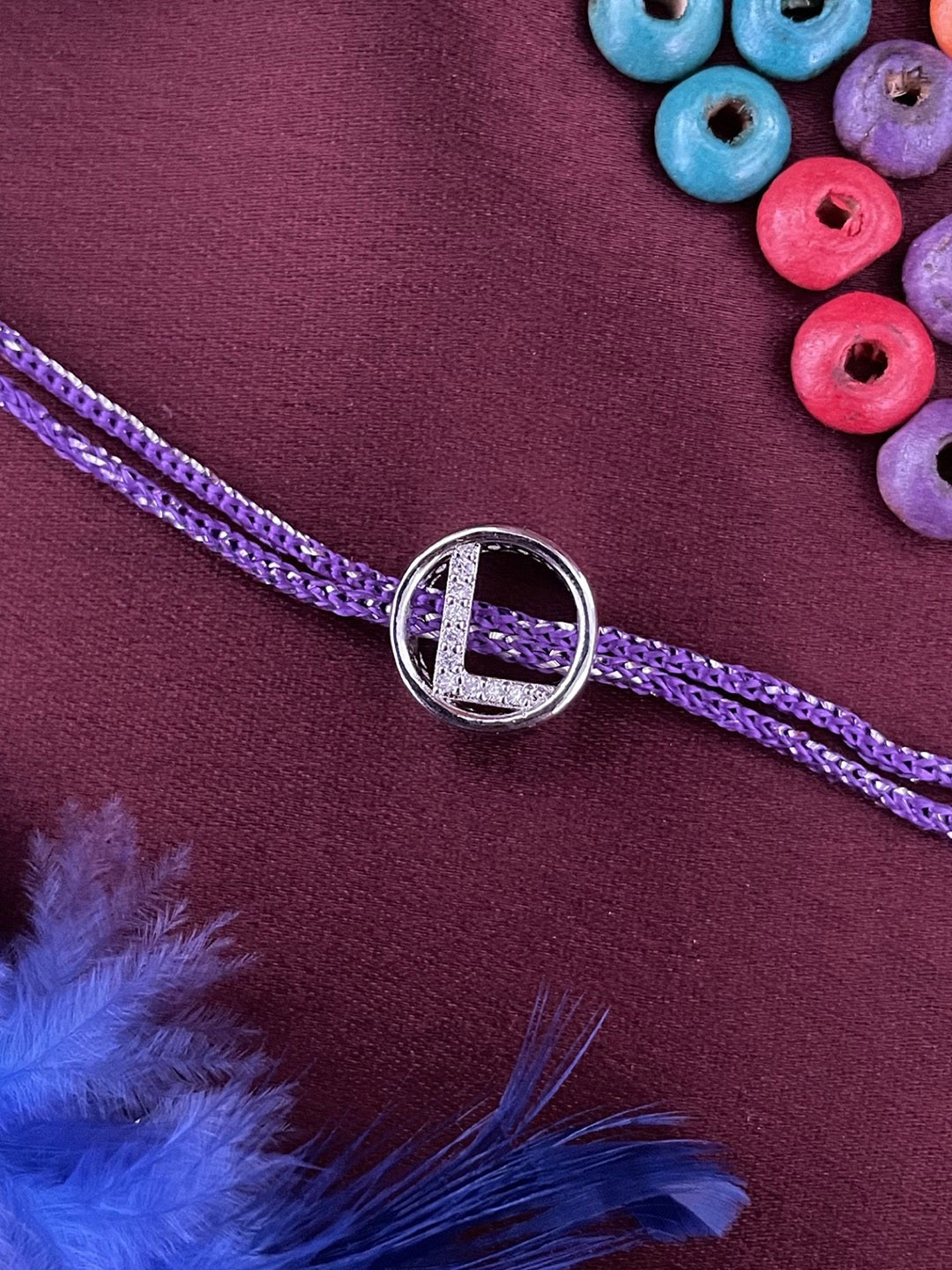 Digital Dress Room Silver Plated L Letter Initial AD Studded Barrel Shape Thread Rakhi