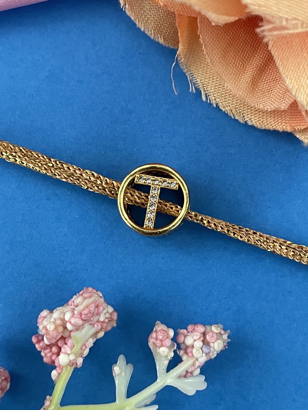 Digital Dress Room T Letter Initial AD Studded Barrel Shape Thread Rakhi