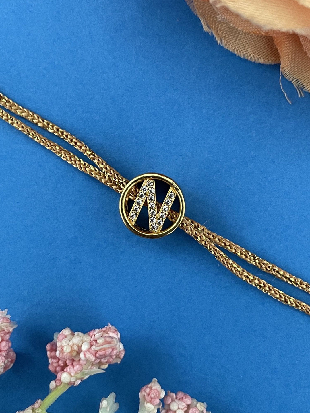 Digital Dress Room N Letter Initial AD Studded Barrel Shape Thread Rakhi