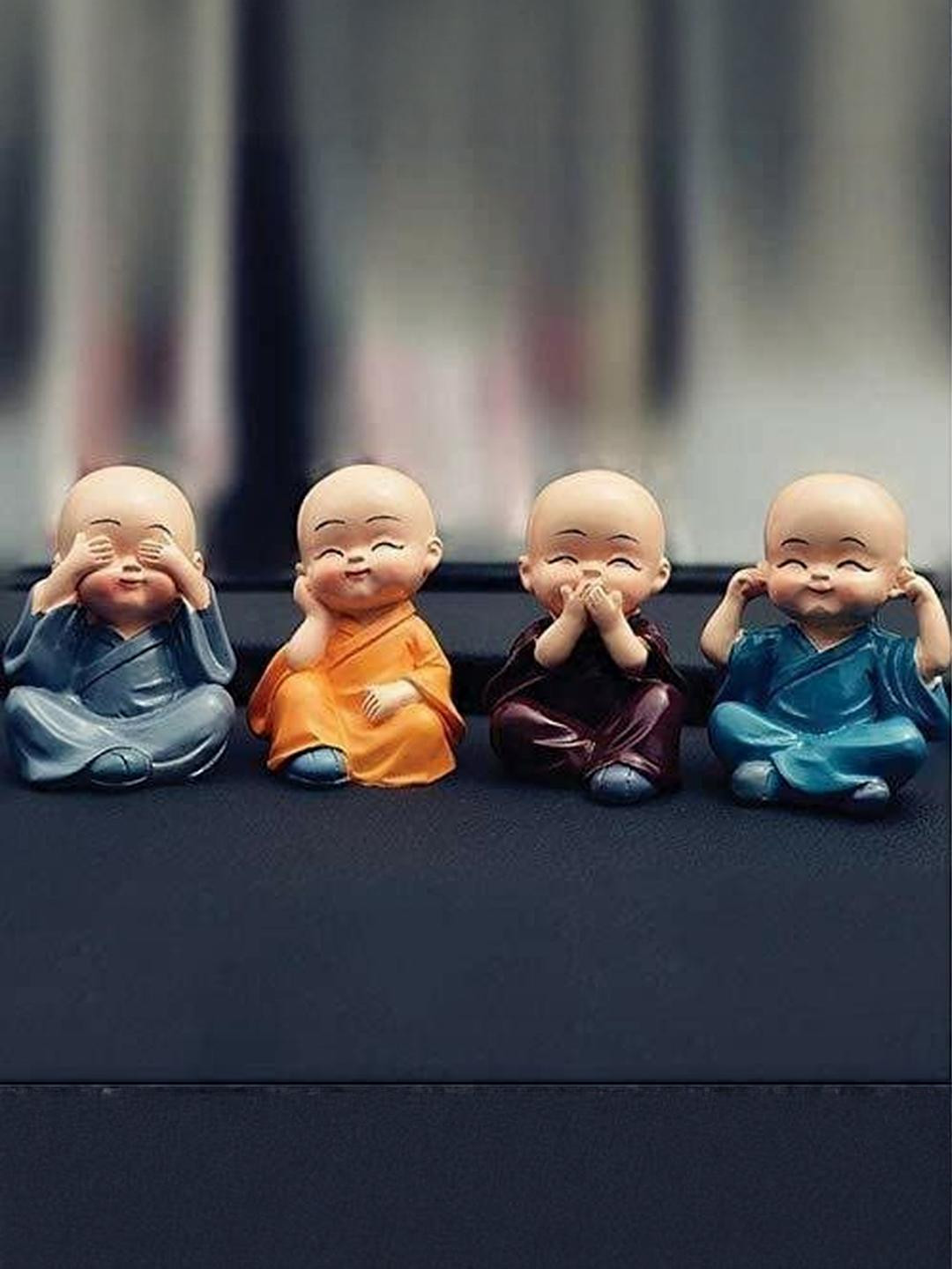 APNA KANHA Set Of 4 Baby Monk Showpieces