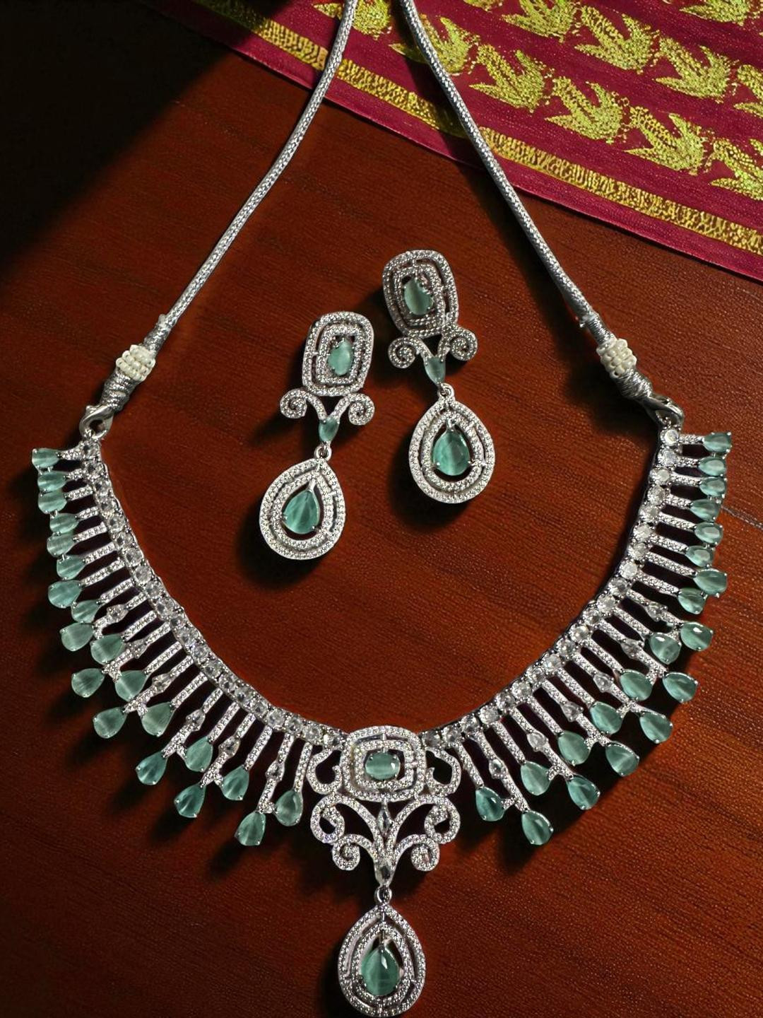 Encrusted Green Stone Rhodium Plated Premium Necklace with drop earring