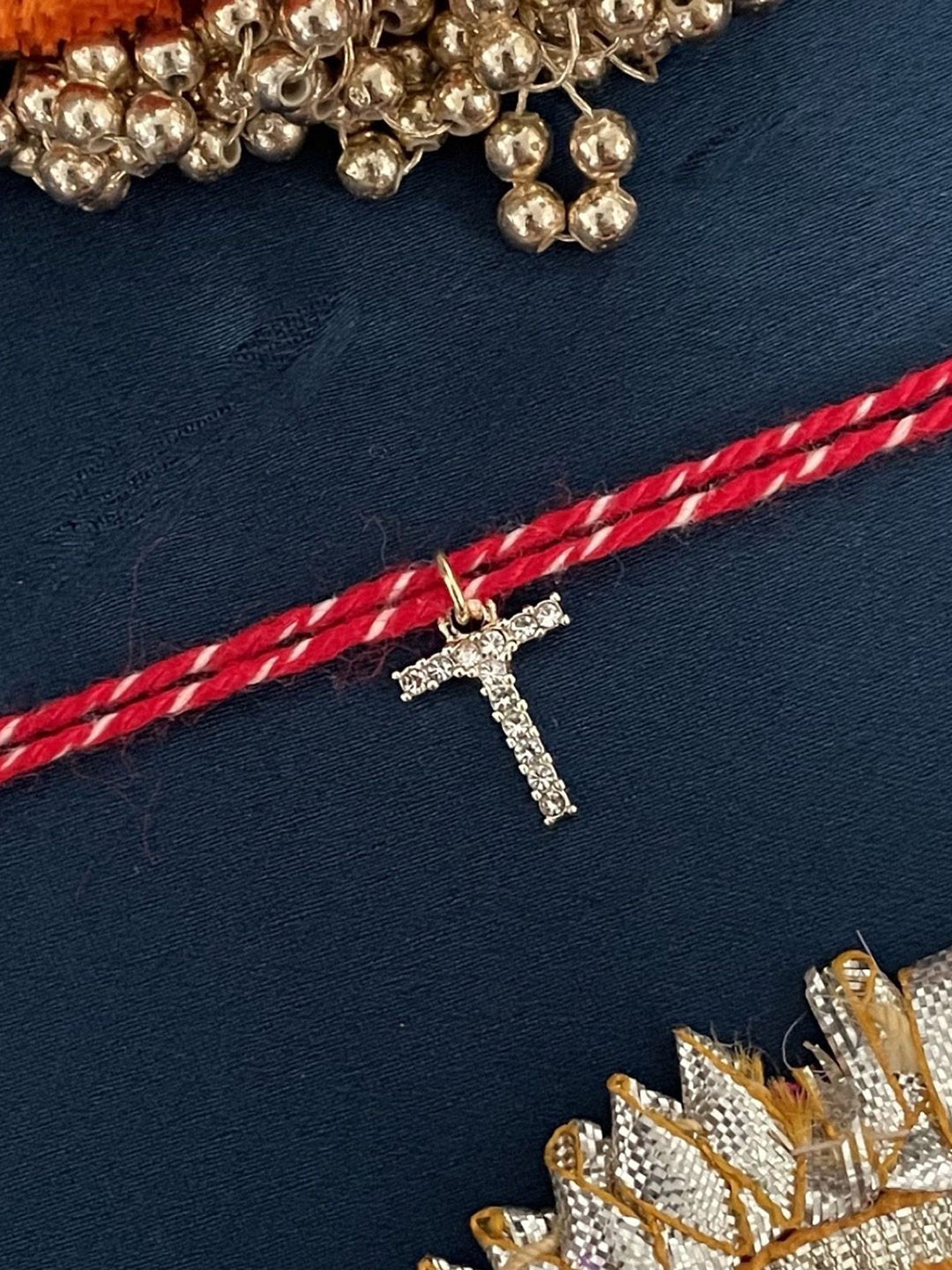 Digital Dress Room American Diamond Studded T Letter Thread Rakhi