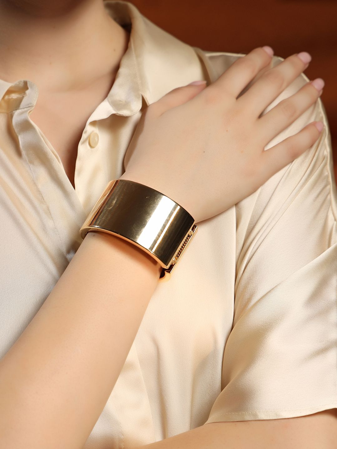 Kazo Women Gold-Plated Modern Grip Cuff Bracelet