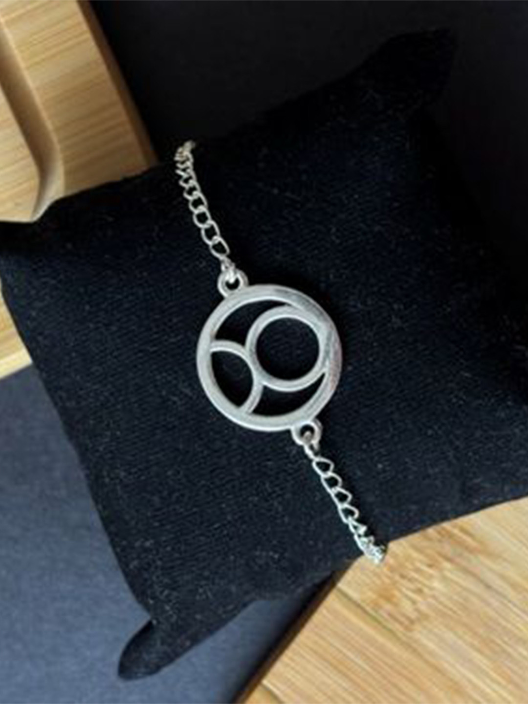 SANAA CREATIONS Silver-Plated Pisces Charm Wraparound Rakhi