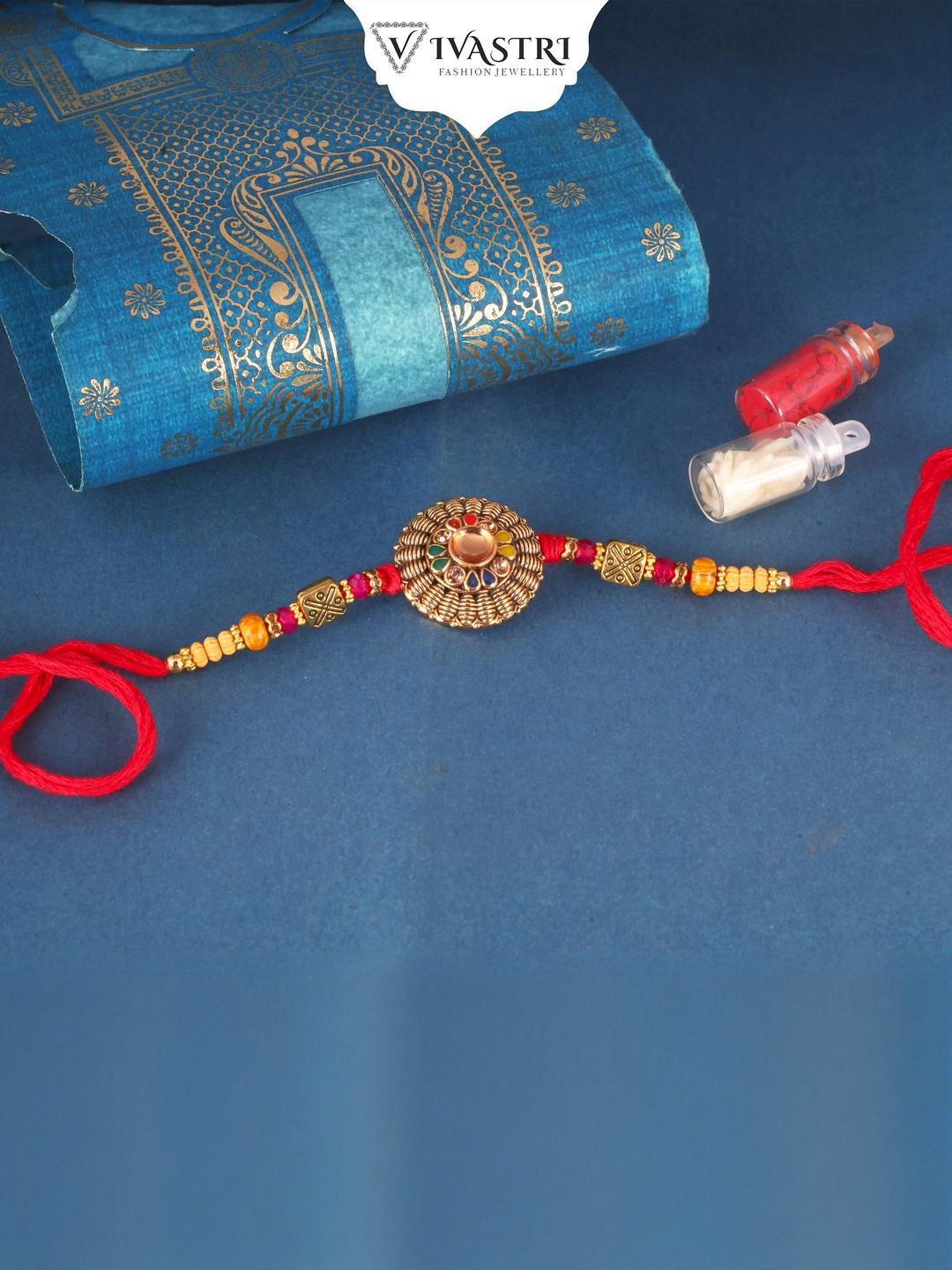 Vivastri Lotus Gold and Rhodium Plated Alloy Rakhi for Lovely Brother [VIVA1179RKG]