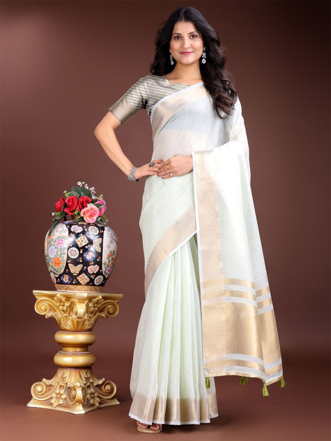 Astita Solid Saree with Contrast Zari Border Tassels
