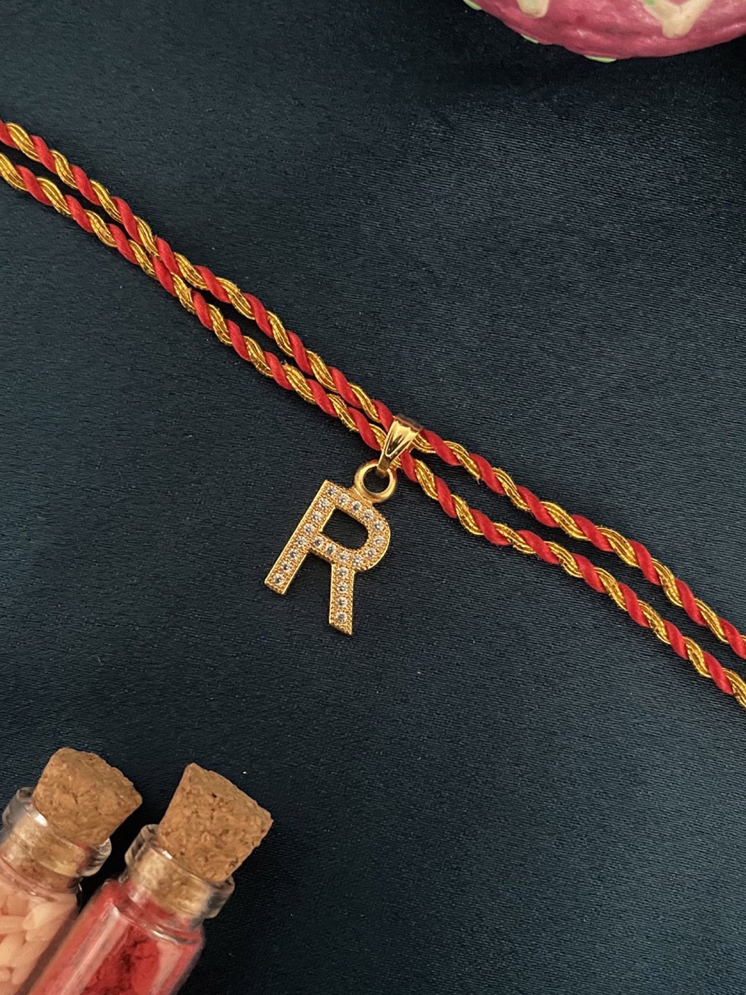 Digital Dress Room American Diamond Studded R Letter Thread Rakhi