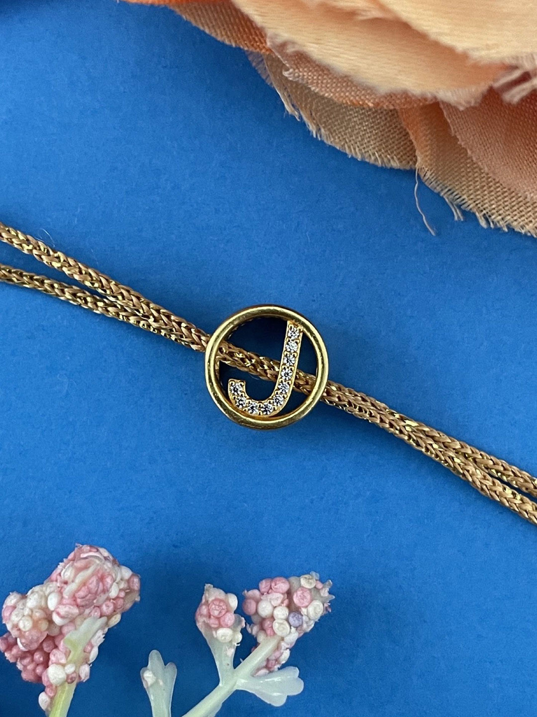 Digital Dress Room American Diamond Studded J Letter Thread Rakhi
