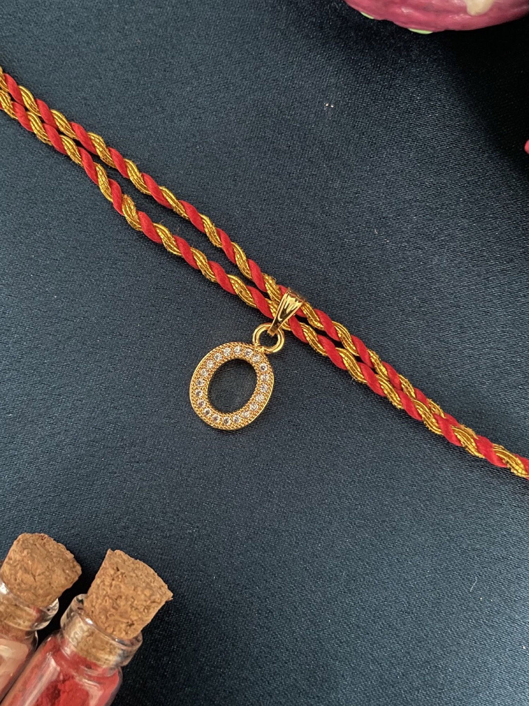 Digital Dress Room Gold Plated O Alphabet AD Studded Initial Thread Rakhi