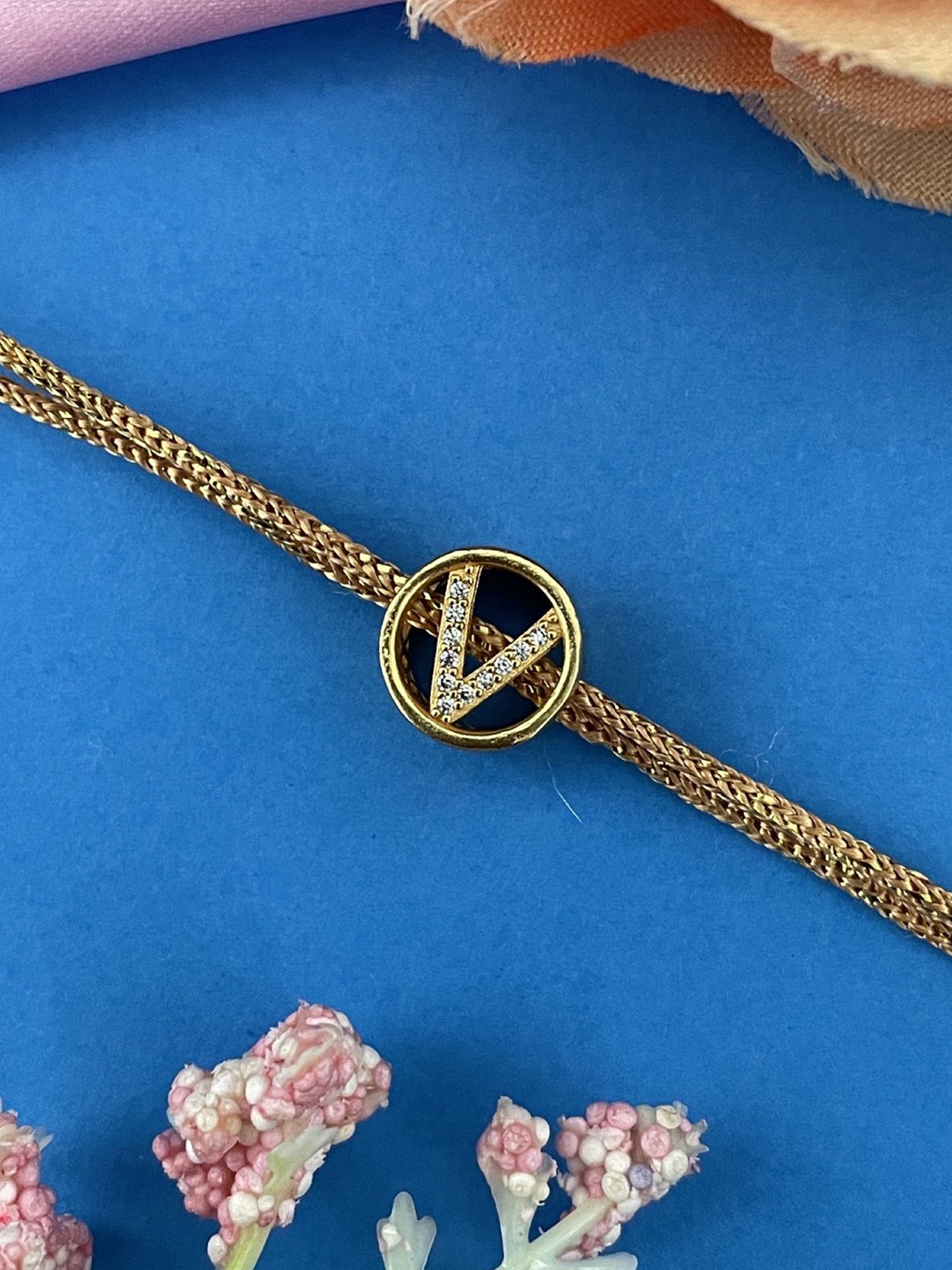 Digital Dress Room V Letter Initial AD Studded Barrel Shape Thread Rakhi