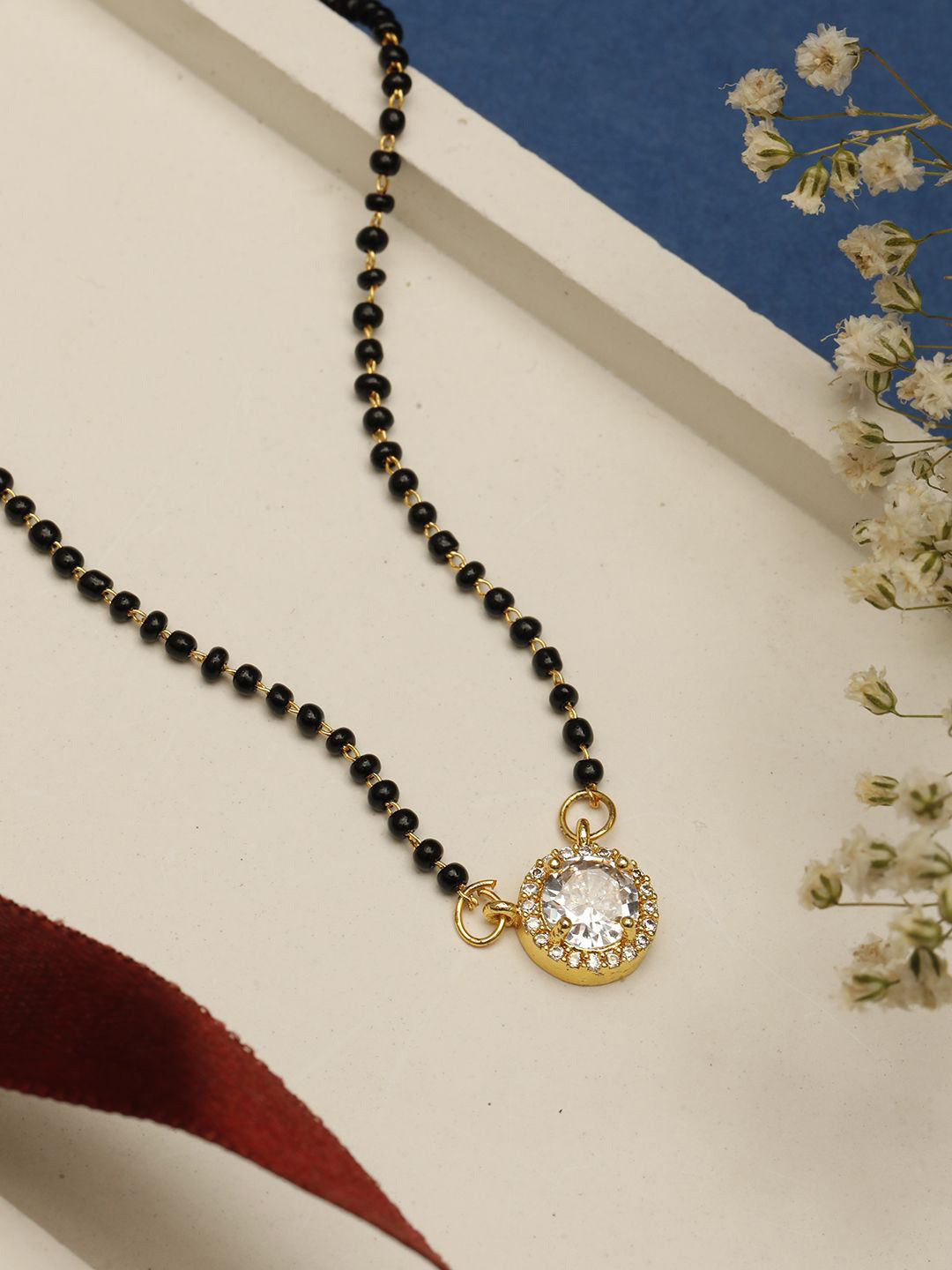 VIVAZS Gold-Plated American Diamond Studded & Beaded Mangalsutra