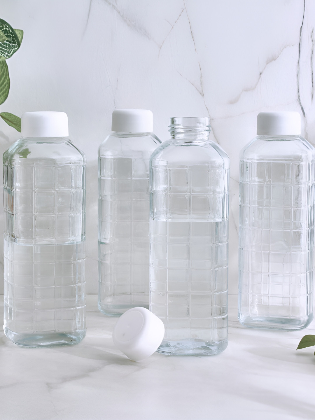 Home Centre Transparent 4 Pieces Glass Water Bottles - 1000ml each