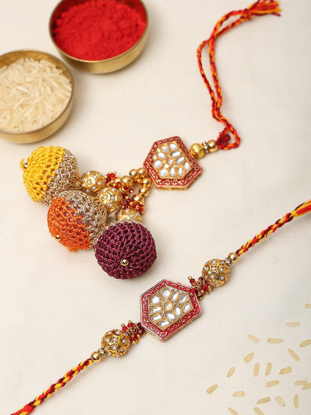 Exotic India Kundan Studded and Beaded Rakhi with Thread Work Latkan