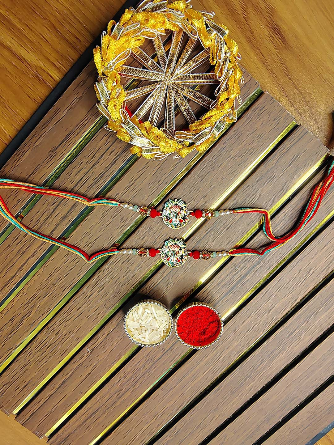 PUFFSMART Artificial Stones Studded & Beaded Ganesh Ji Bhaiya Bhabhi Rakhis