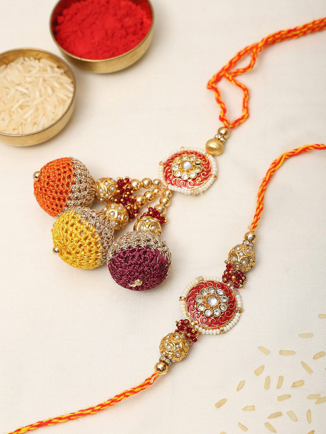 Exotic India Kundan Studded and Beaded Rakhi with Thread Work Latkan
