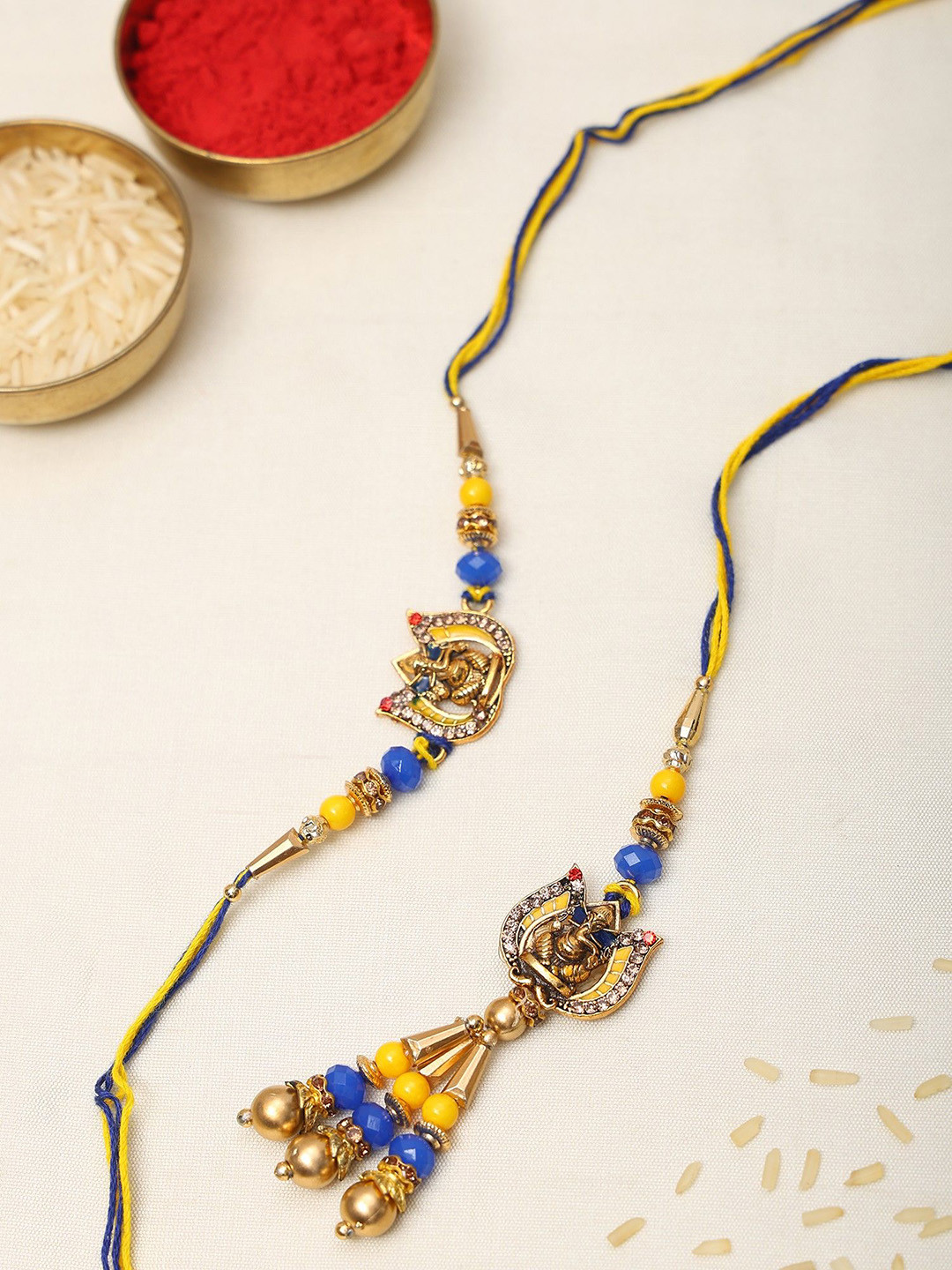 Exotic India Lord Ganesha Lotus Design Bhaiya Bhabhi Thread Rakhi