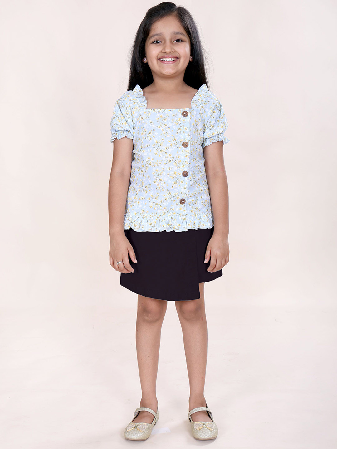 KiddoPanti Girls Printed Top With Puff Sleeve & Over Lap Skort Clothing Set
