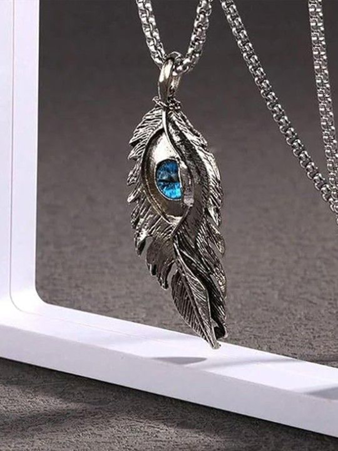 P. R. PRINTS Silver-Plated Artificial Stones Studded Eye Feather Pendant With Chain