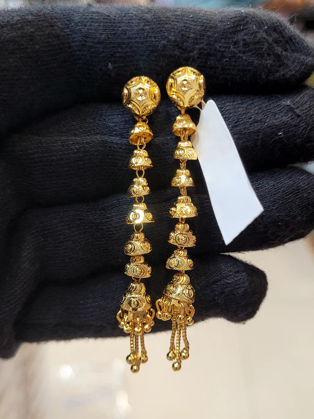Anshenterpris Gold-Plated Hanging Sui Dhaga Dome Shaped Jhumkas