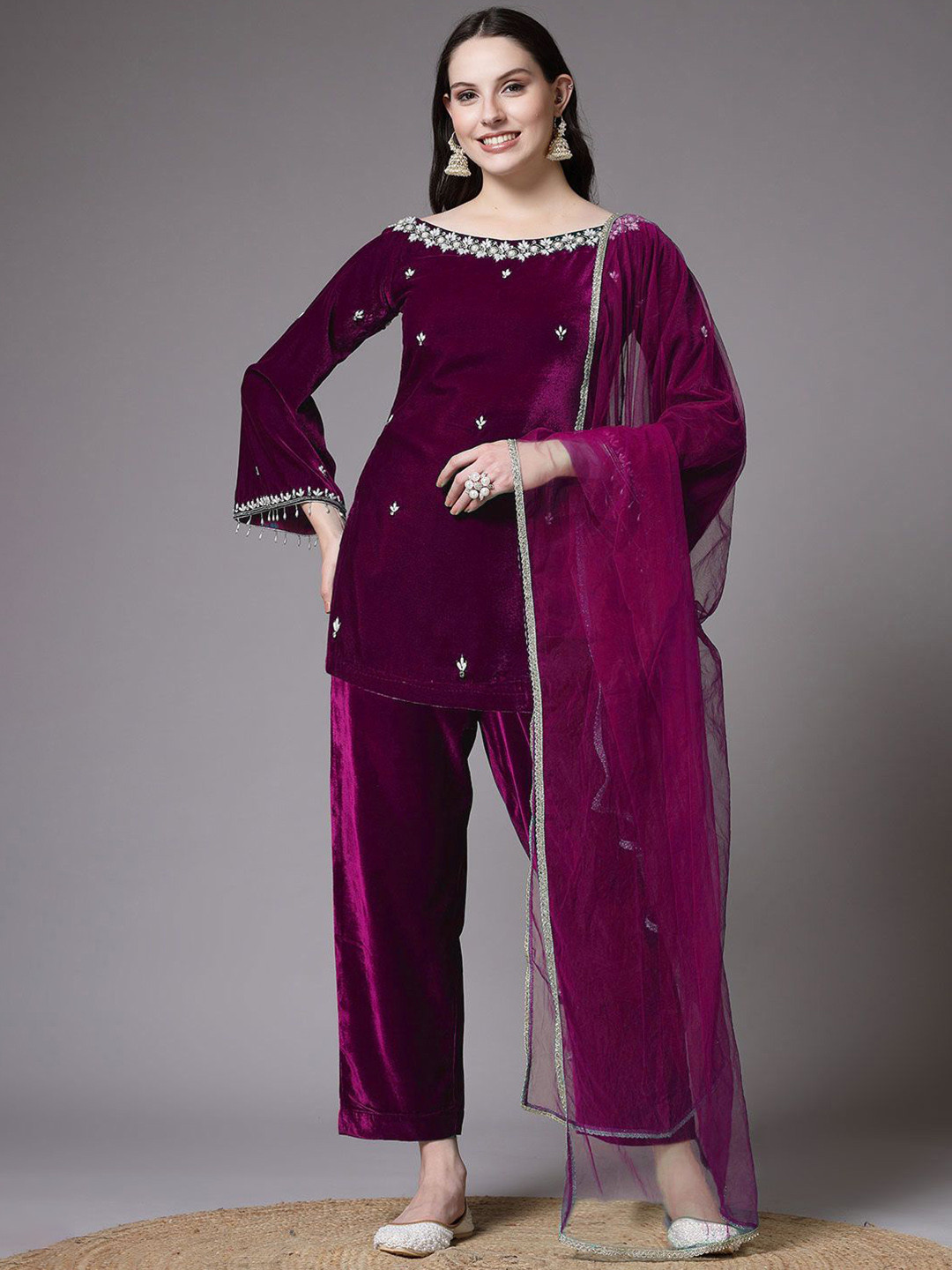 Utsav Fashion Women Embroidered Velvet Suit in Magenta