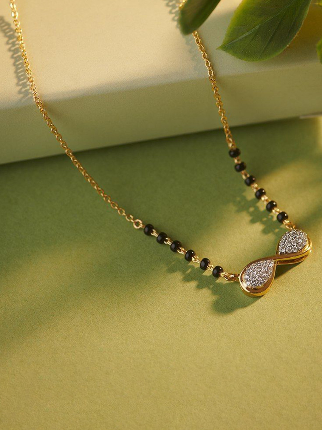 Anouk Gold-Plated Artificial Stones Studded & Beaded Infinity Mangalsutra