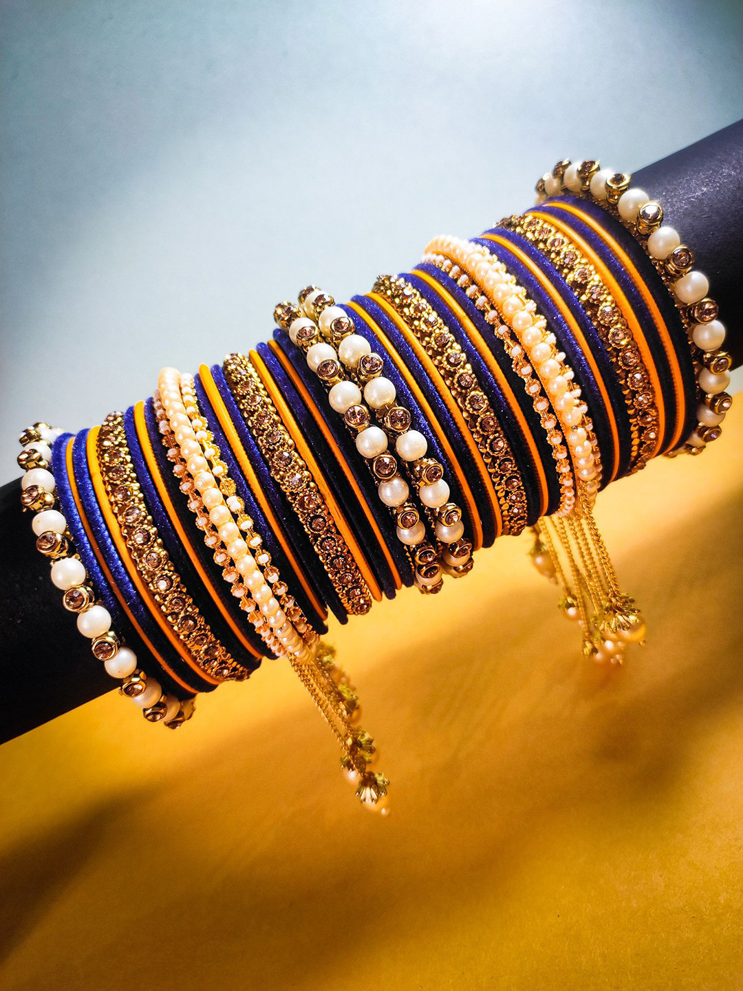Amika Set Of 42 Gold-Plated Stone-Studded & Beaded Bangles