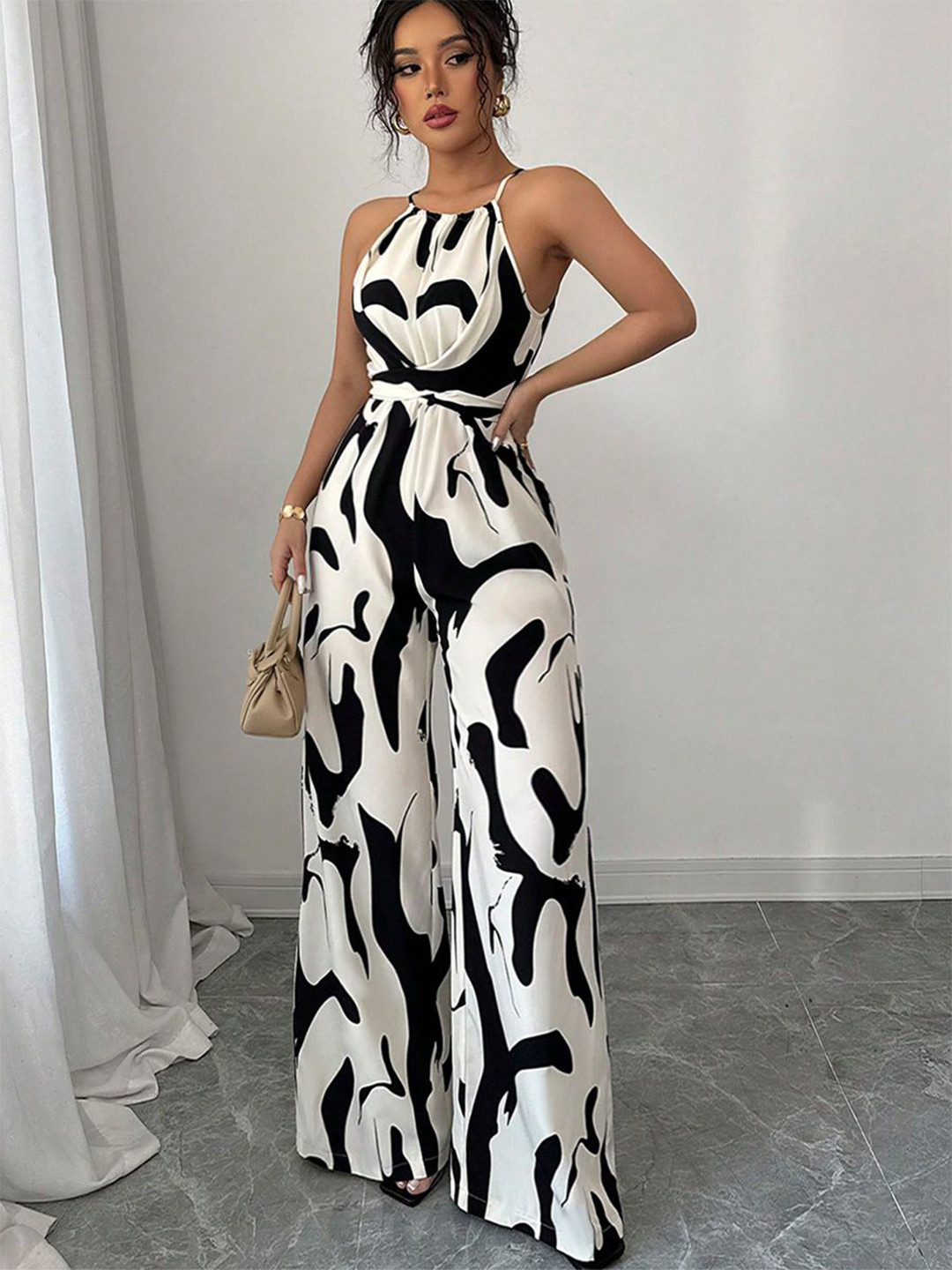 StyleCast Women Abstract Printed Waist Tie-Up Sleeveless Jumpsuit