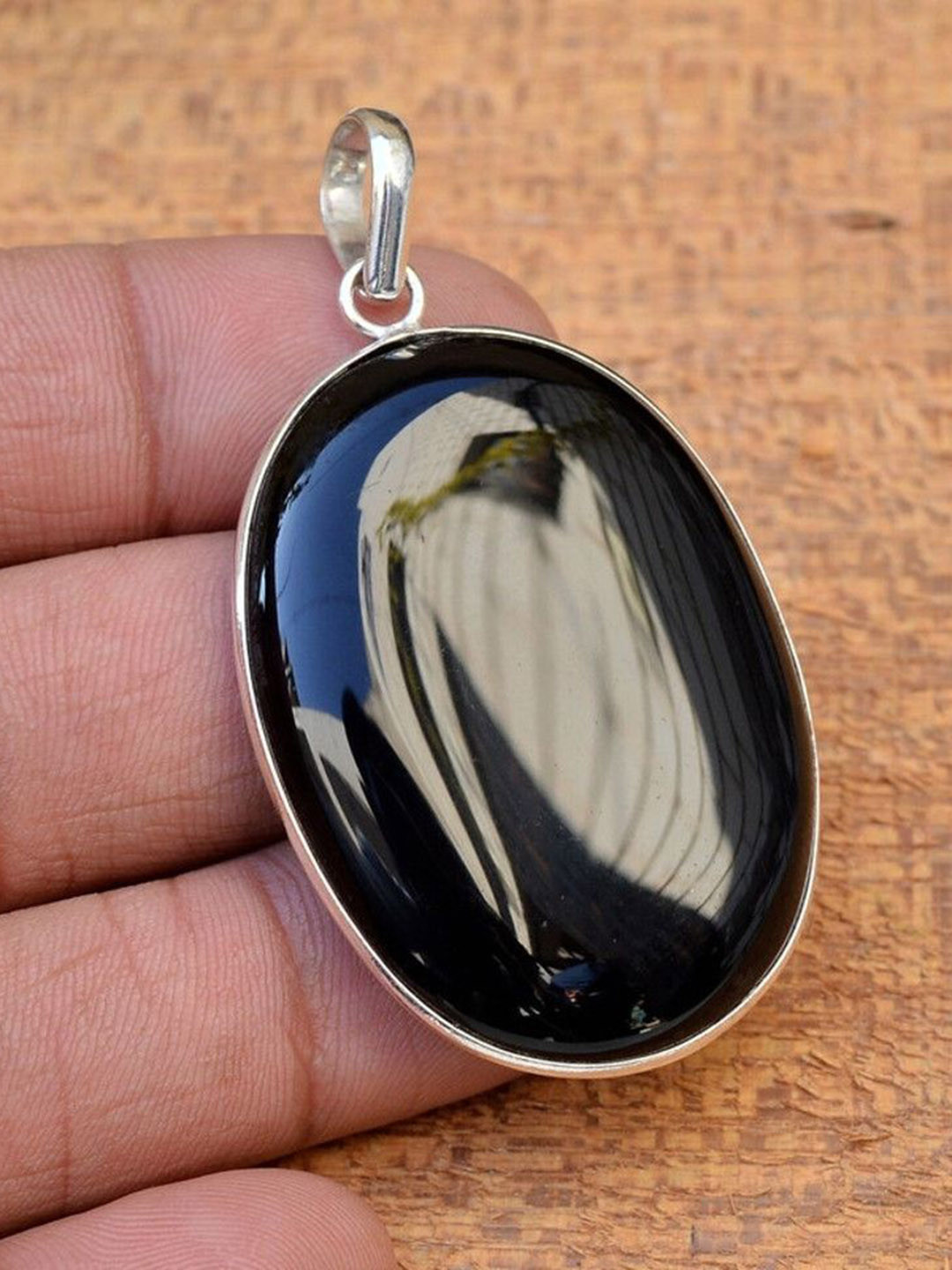 GenZcomplex Oval Shaped Sulemani Hakik Stone Pendant