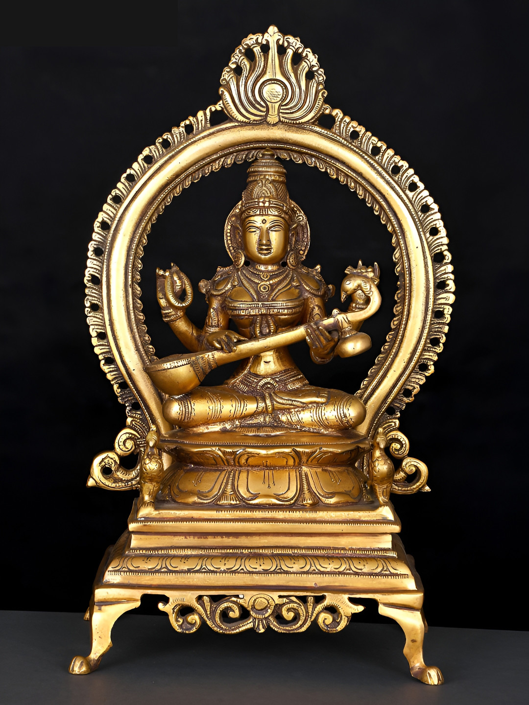 Exotic India Gold-Toned Goddess of Knowledge Maa Saraswati Religious Idol Showpiece