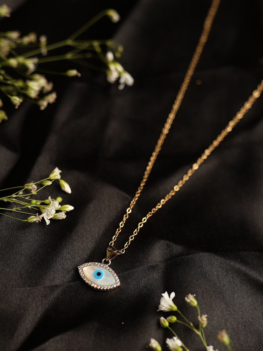 Ishil Blue Eye Gold-Plated Artificial Studded Contemporary Pendant With Chain