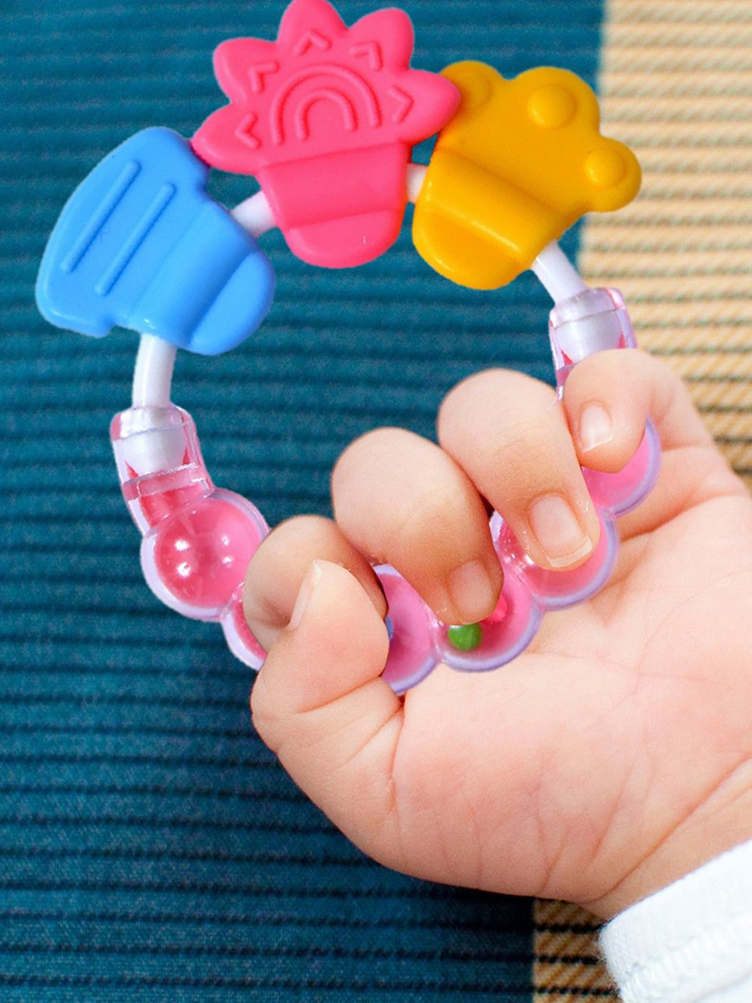 Joy Buzz Textured Rattle Silicone Teether