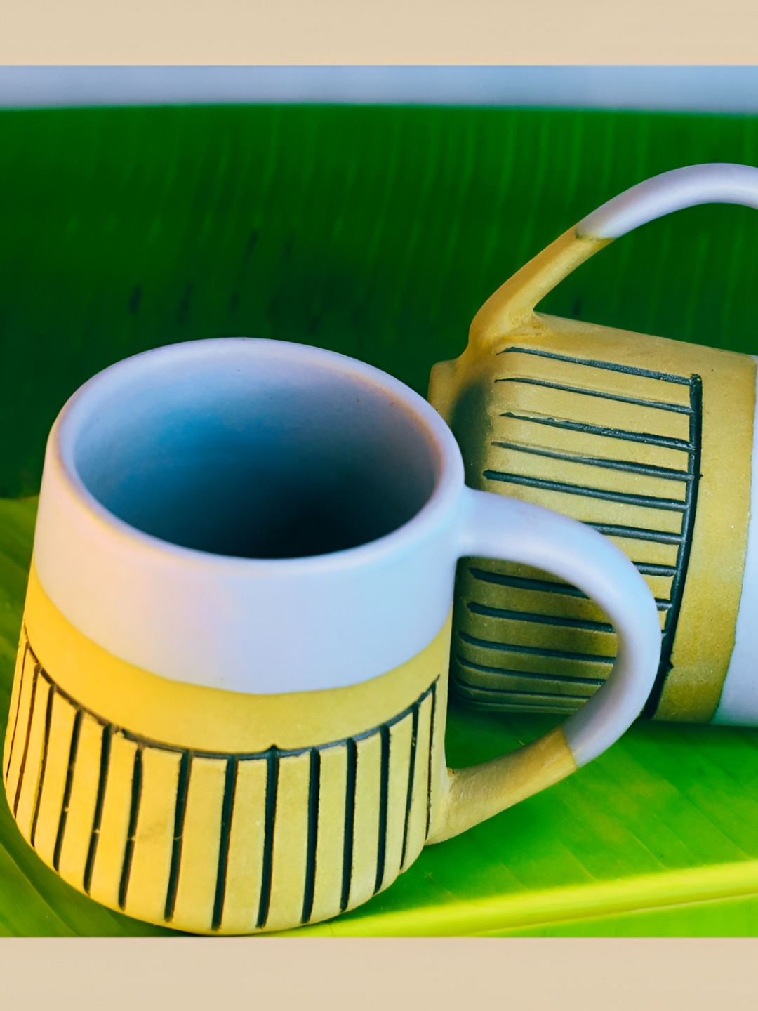 TheYUGO Blue & Yellow 2 Piece Printed Ceramic Glossy Mugs Set